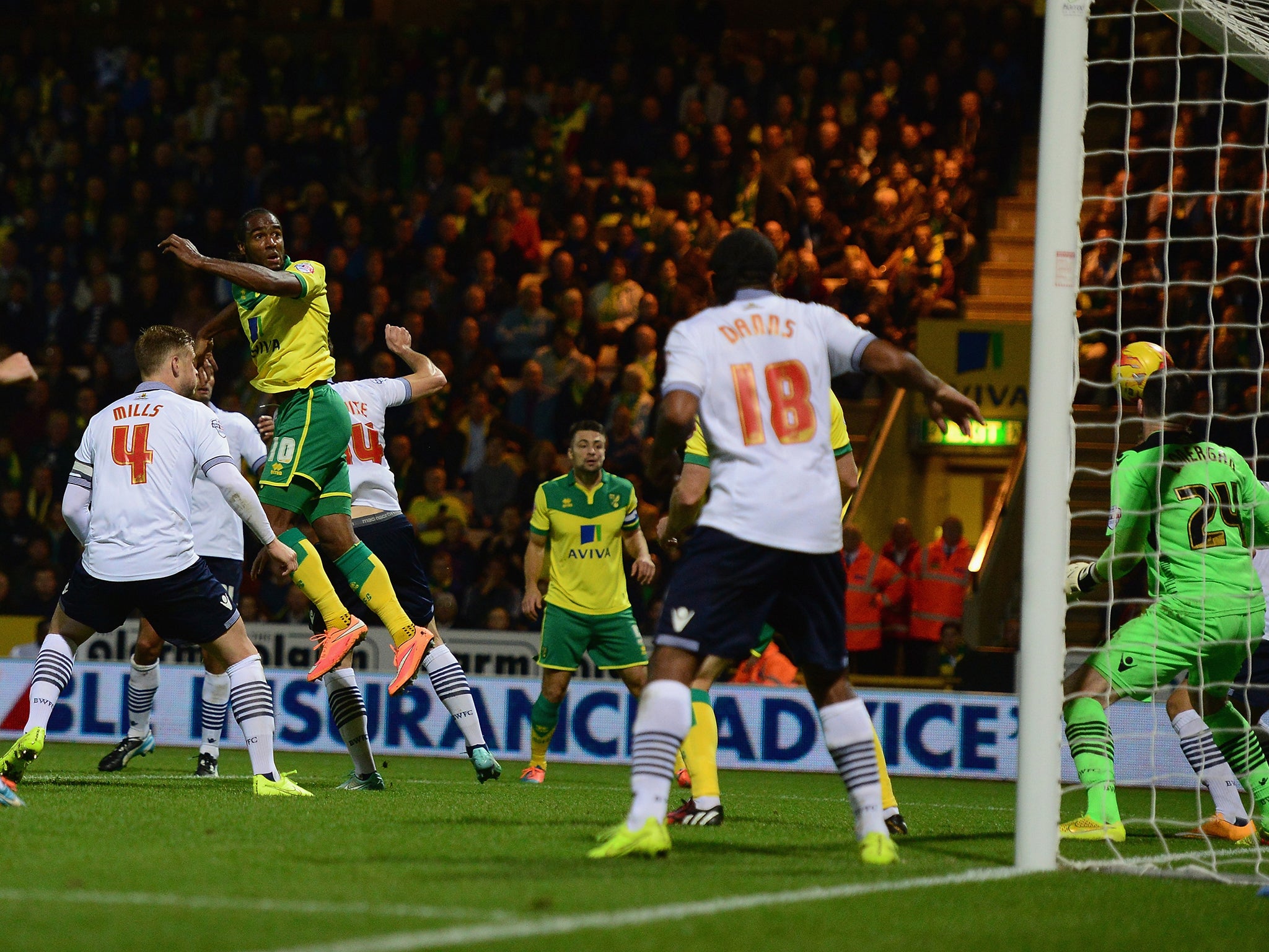Cameron Jerome scores a goal for Norwich City during the Sky Bet Championship match between Norwich City and Bolton Wanderers