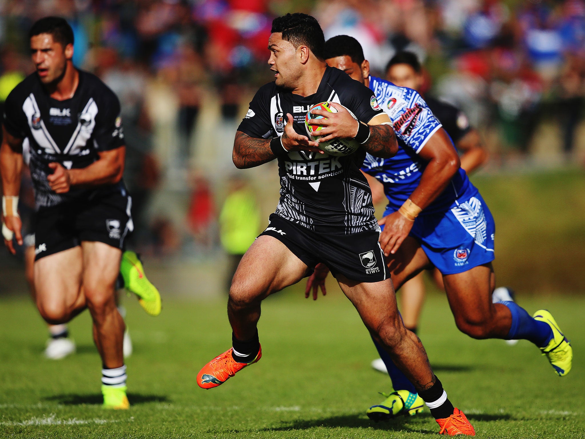 Isaac Luke runs with the ball during New Zealand's 14-12 win over Samoa