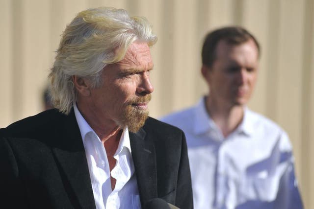 Virgin founder Sir Richard Branson speaking at the press conference at the Mojave Air and Space Port in California