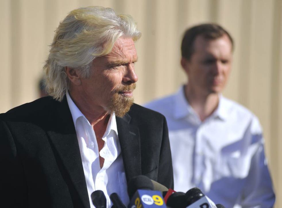 Virgin founder Sir Richard Branson speaking at the press conference at the Mojave Air and Space Port in California