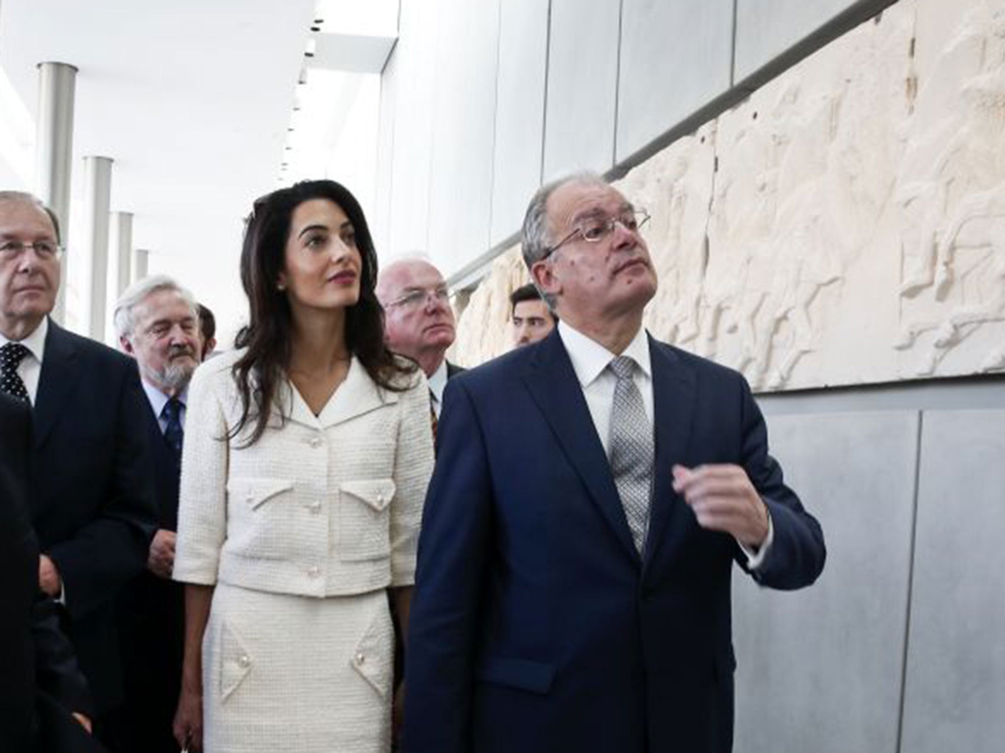 Greek culture minister Konstantinos Tasoulas with Amal Clooney