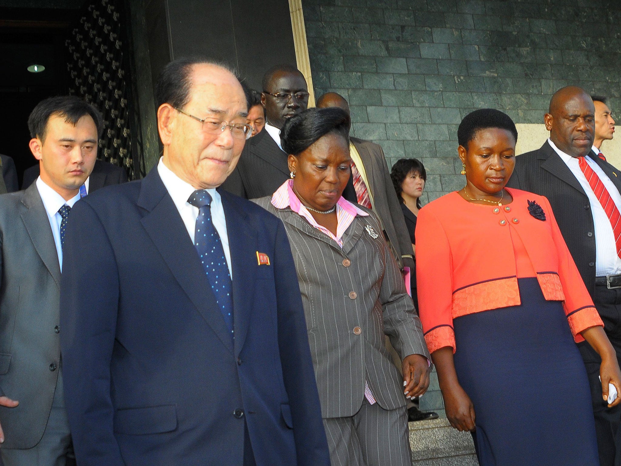 Kim Yong Nam, foreground-left, is visiting Uganda as part of a rare tour of Africa, where North Korea has actively tried to find allies like the long-serving Ugandan President Yoweri Museveni, who gave a state dinner in honor of Kim Yong Nam and commended