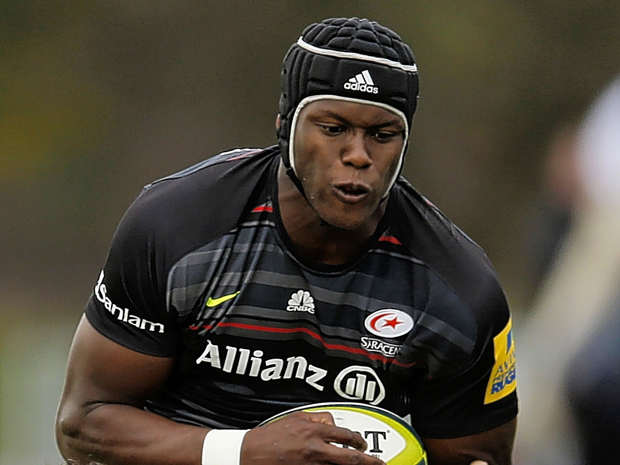 Maro Itoje, of Saracens, is tackled by Harlequins’ George Lowe during Sunday’s Anglo-Welsh Cup