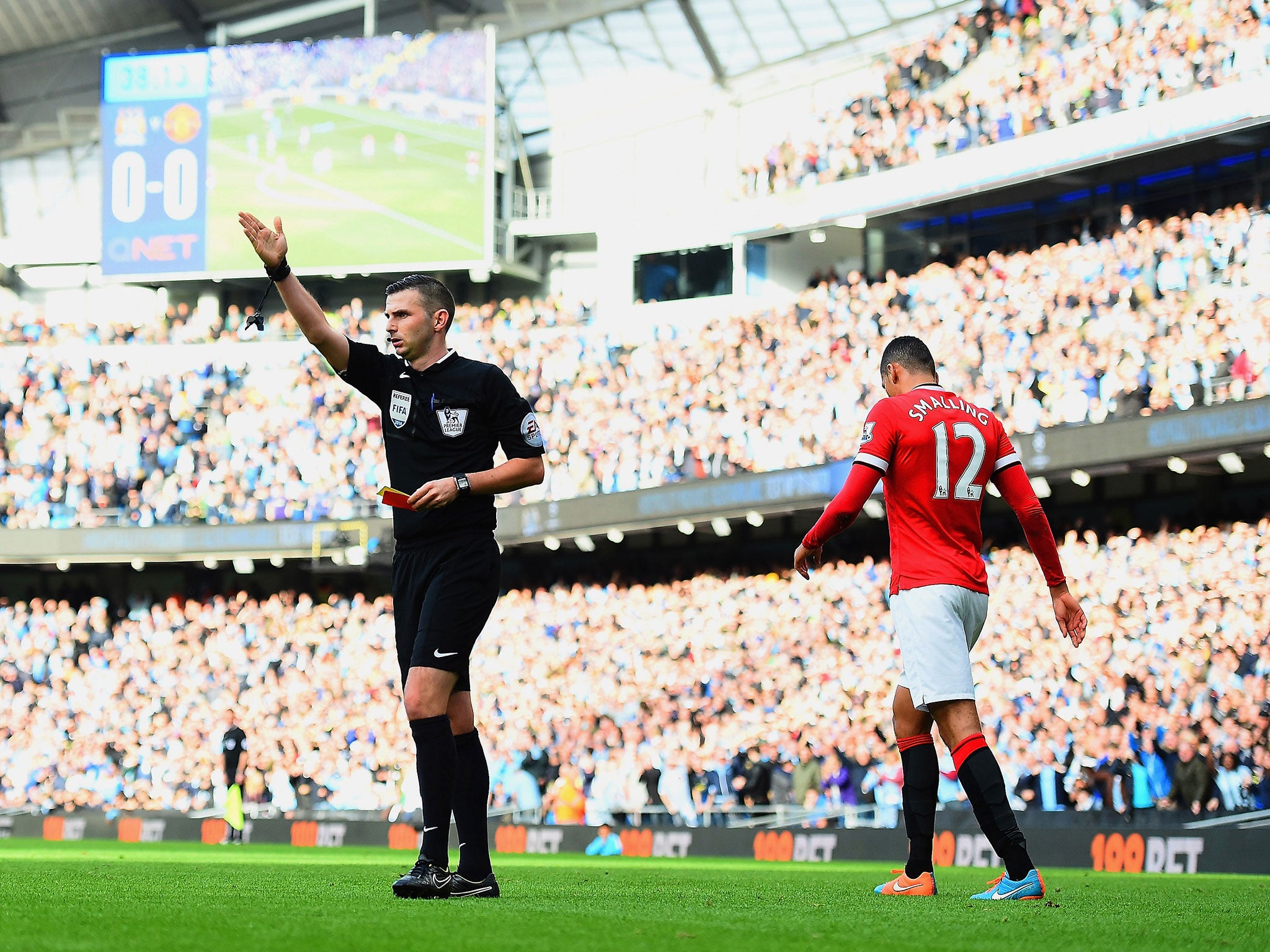 Chris Smalling is given a red card during Manchester United's 1-0 defeat to Manchester City