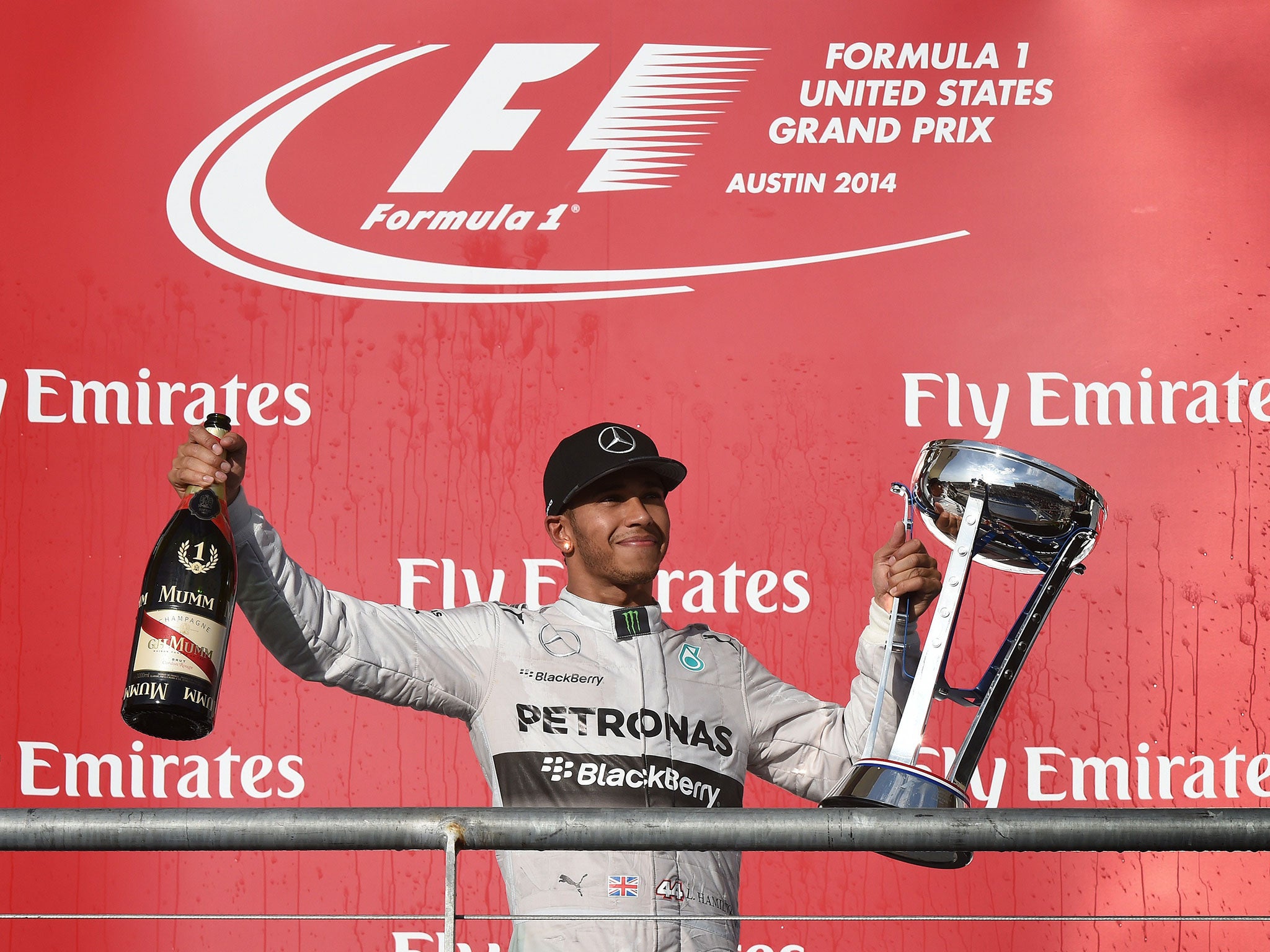 Lewis Hamilton celebrates winning the US Grand Prix