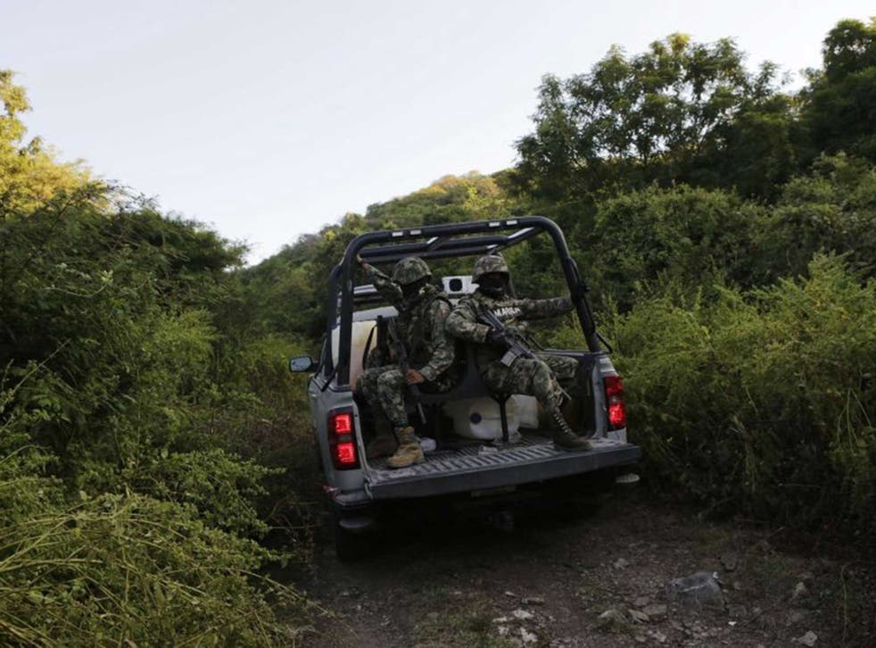 Mexican marines conduct a search