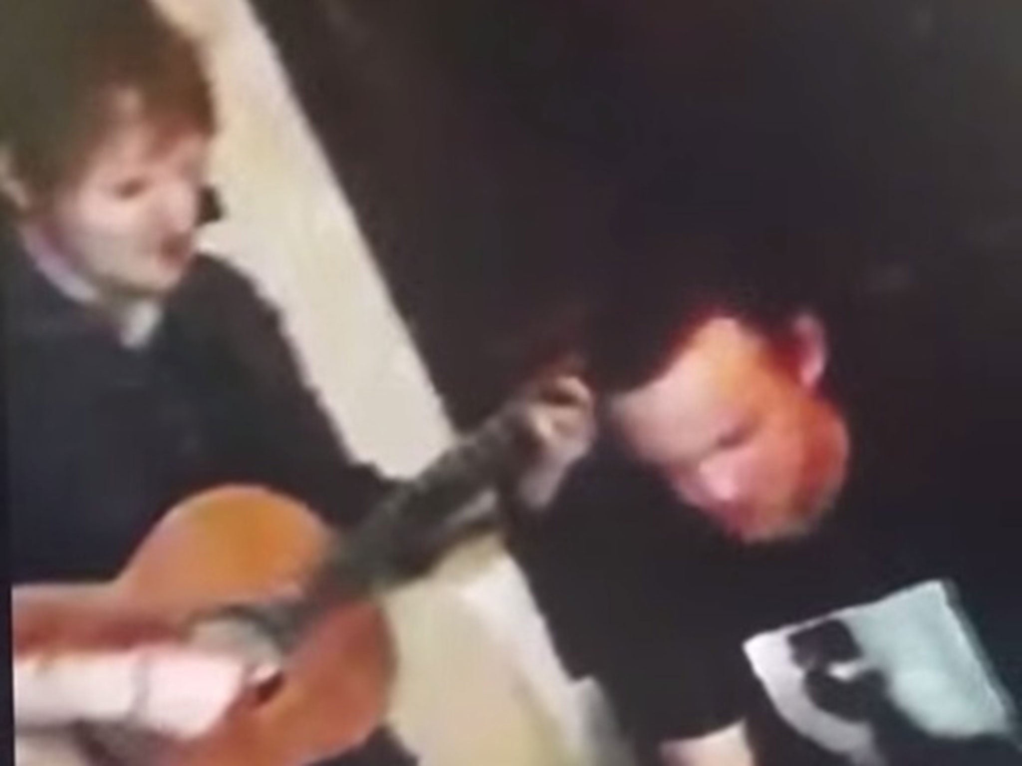 Ed Sheeran and Wayne Rooney perform at the Sir Ralph Abercromby pub near Deansgate