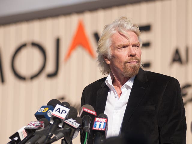 Virgin founder Sir Richard Branson speaks at a press conference at the Mojave Air and Space Port in Mojave, California on November 1, 2014.