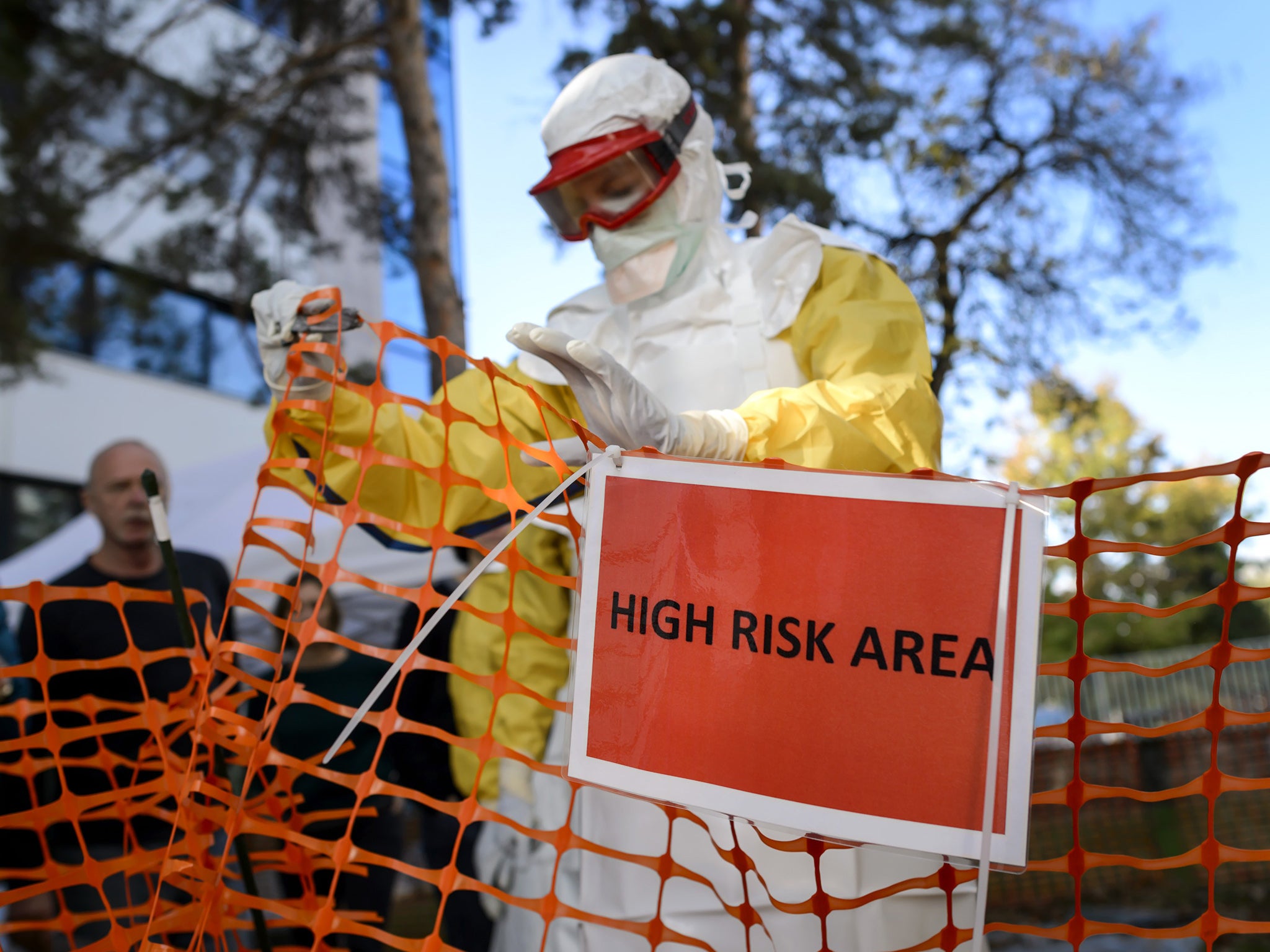 Health workers of the International Federation of Red Cross (IFRC) and Medical charity Medecins Sans Frontieres (MSF) take part in a pre-deployment training for staff that is heading to Ebola area at the IFRC headquarters in Geneva 