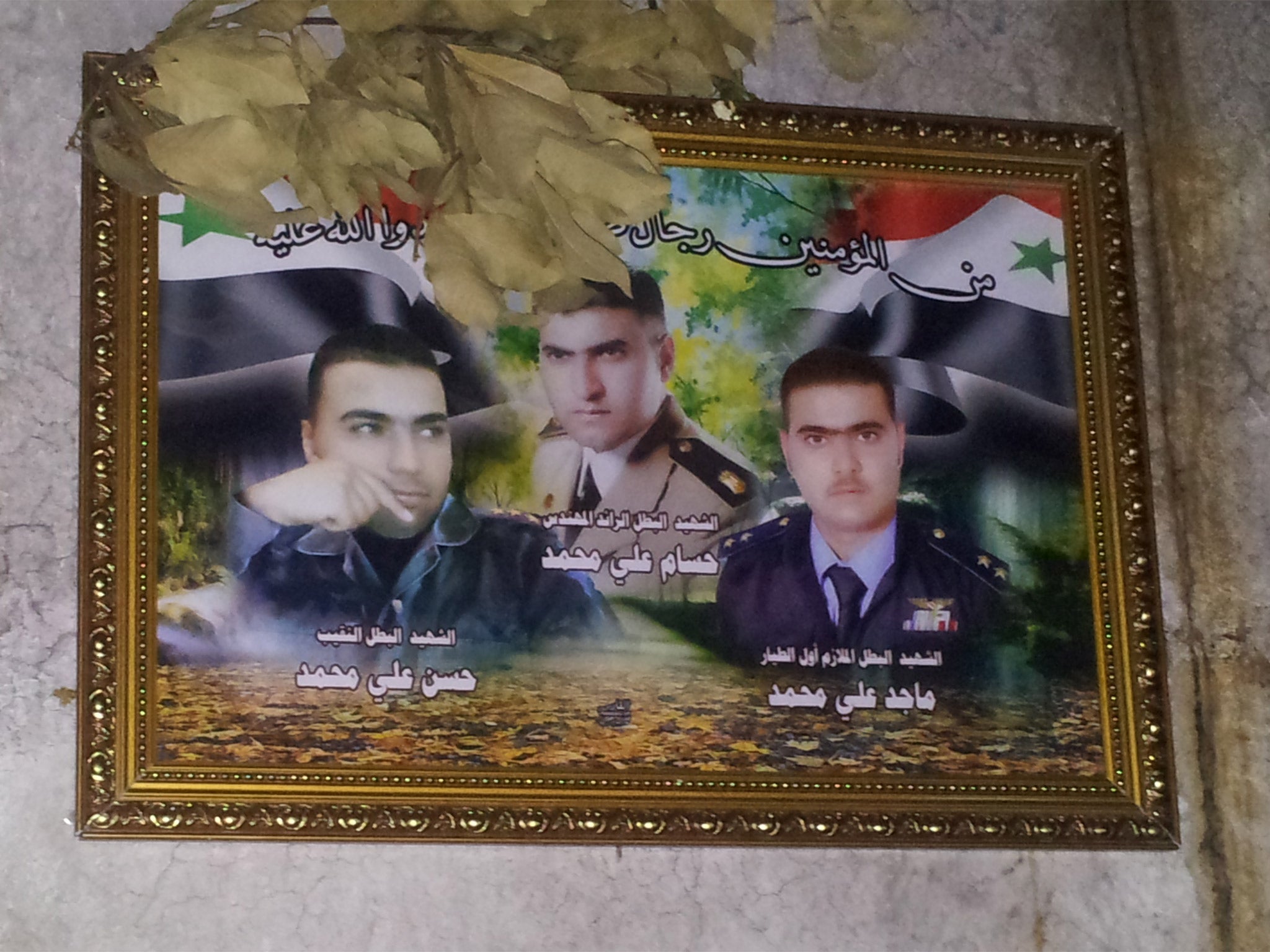 The only pictures on Ali and Ebtisam Mohamed’s walls are of their three dead soldier-sons