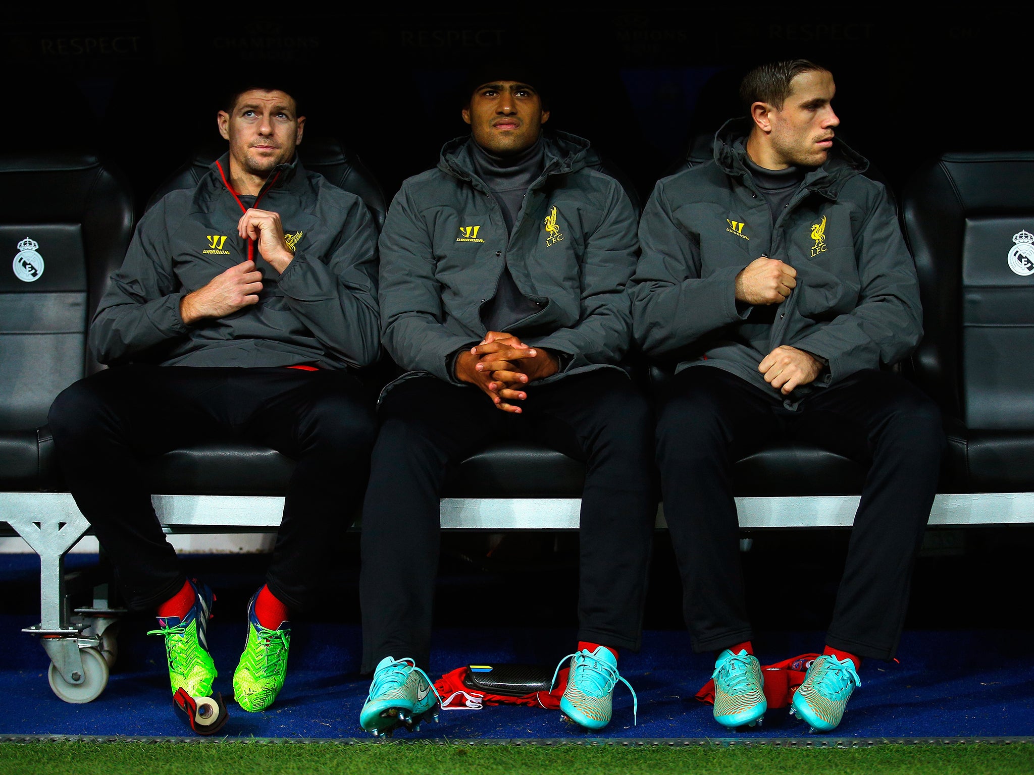 Steven Gerrard, Glen Johnson and Jordan Henderson on the bench