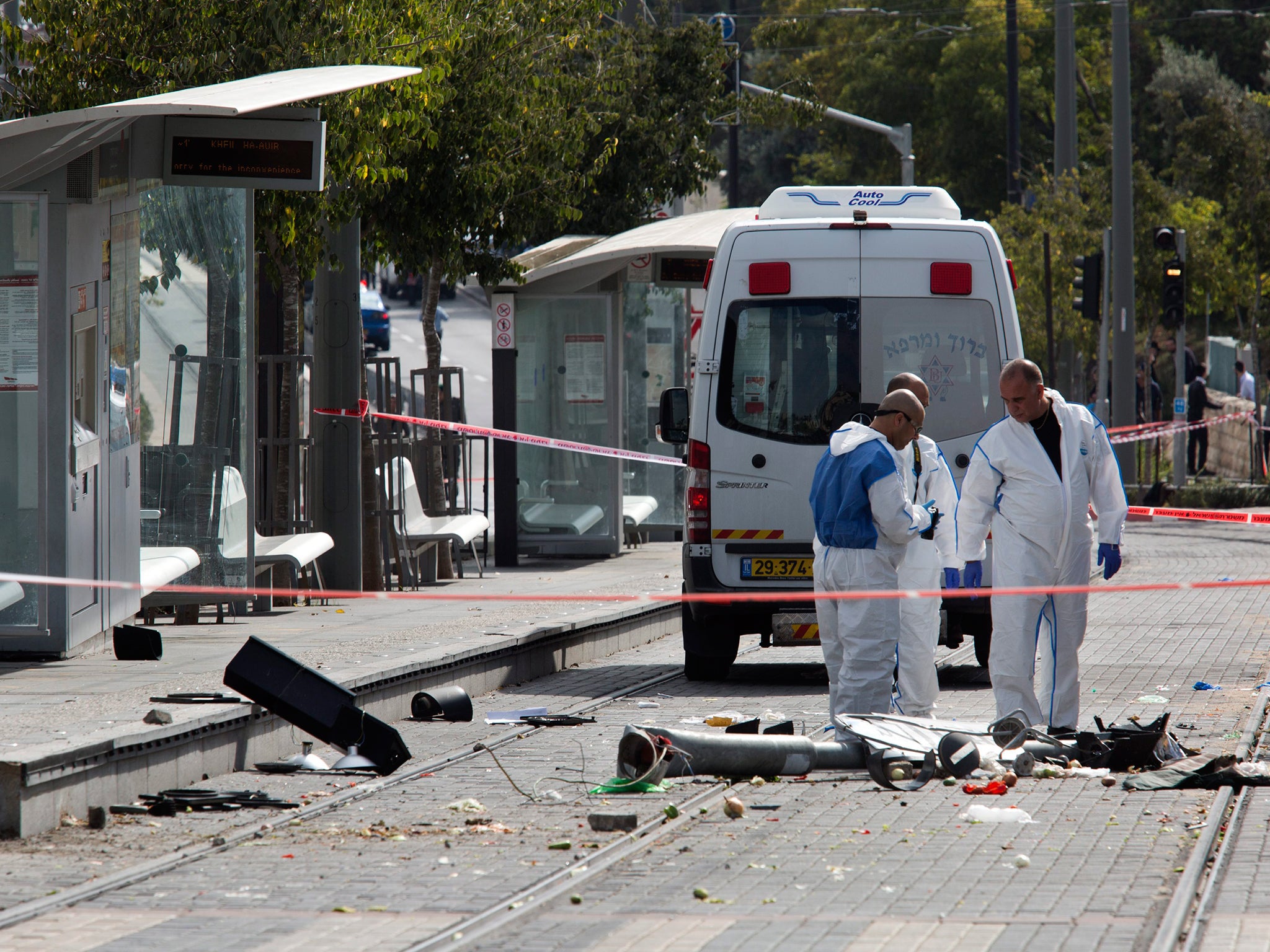 Israeli police say one dead and 13 hurt as car rams crowd in East ...