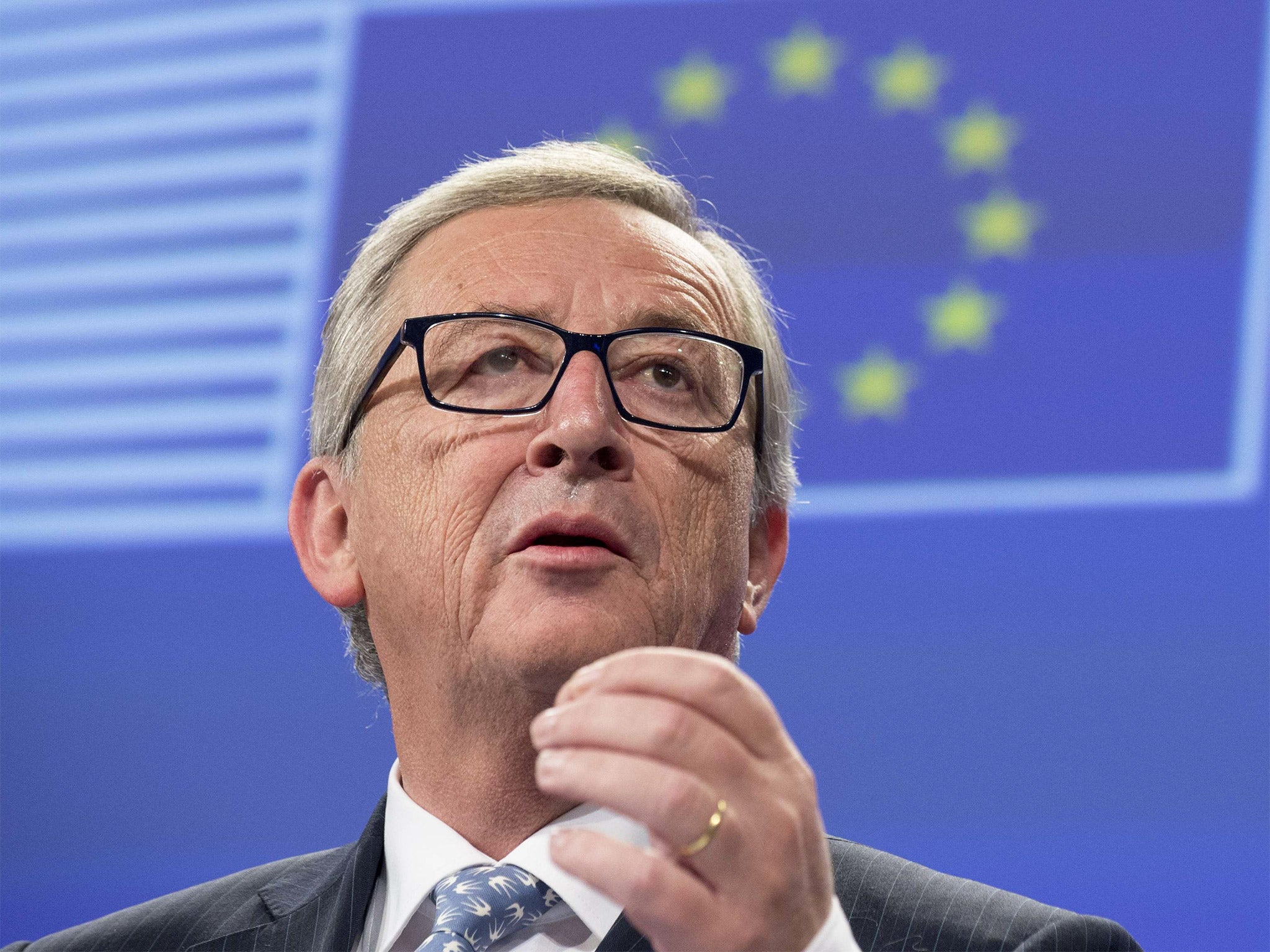 European Commission chief Jean-Claude Juncker gestures during a press conference in Brussels on Wednesday