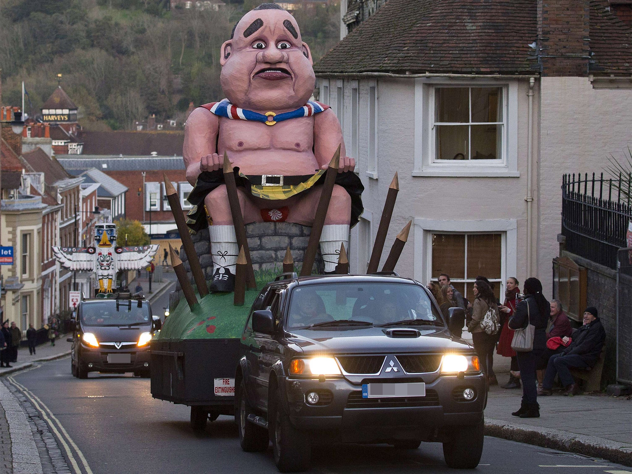 An effigy of defeated Scottish independence leader Alex Salmond is paraded through Lewes, Sussex, before it gets burnt in the traditional bonfire celebrations