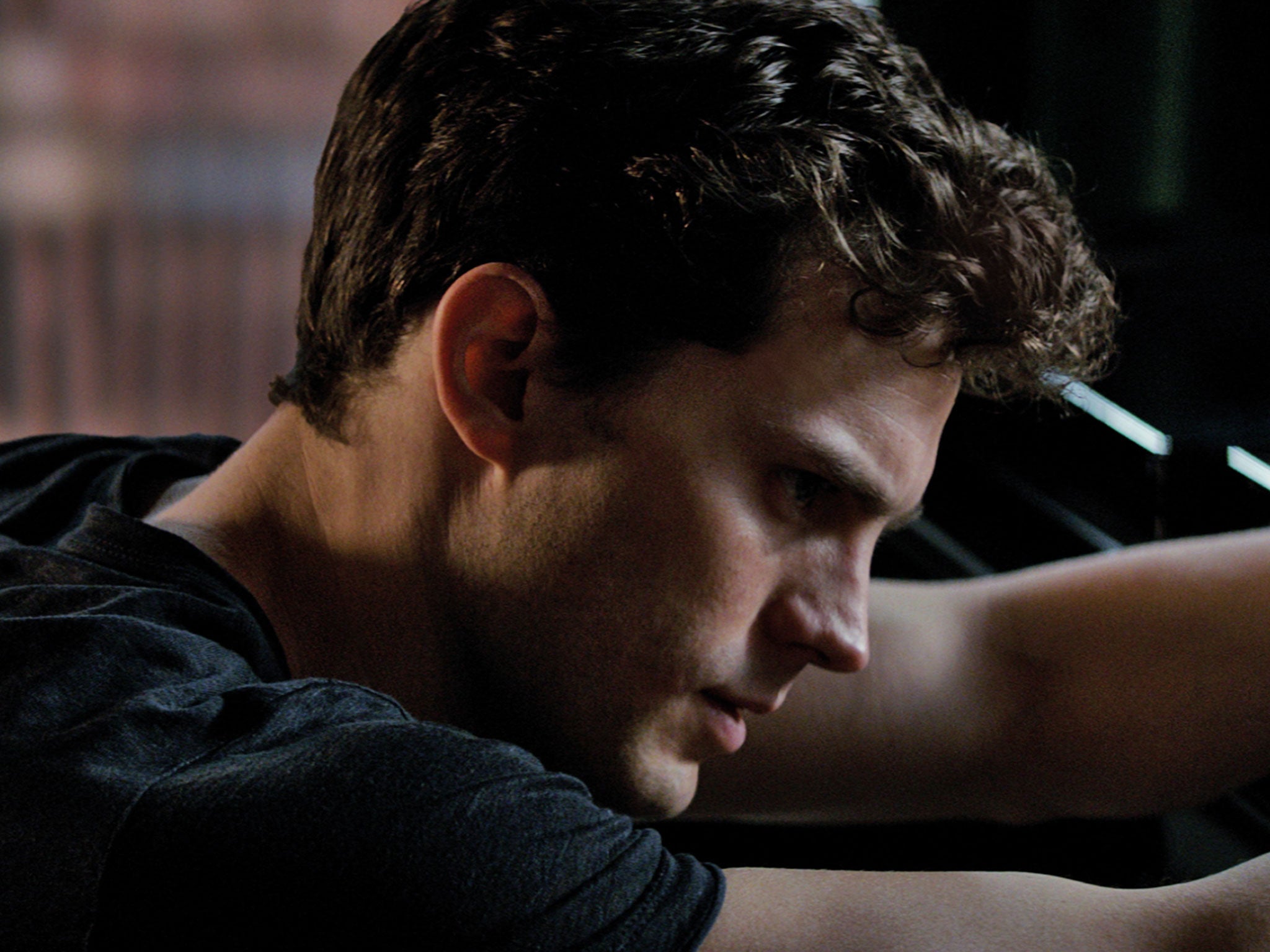 Jamie Dornan as Christian Grey in Fifty Shades of Grey, which has its world premiere at the Berlin Film Festival