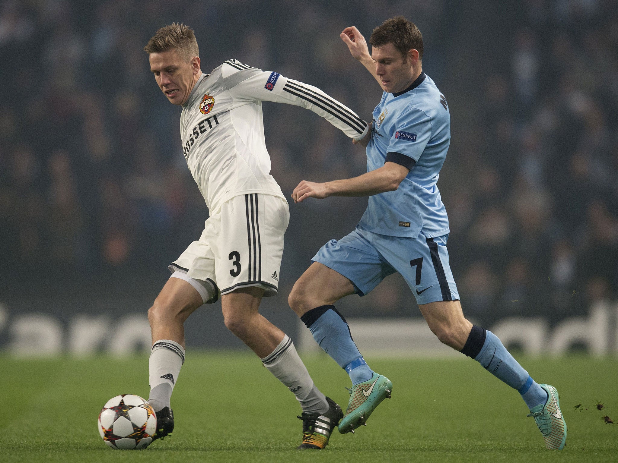 Pontus Wernbloom shields the ball away from James Milner