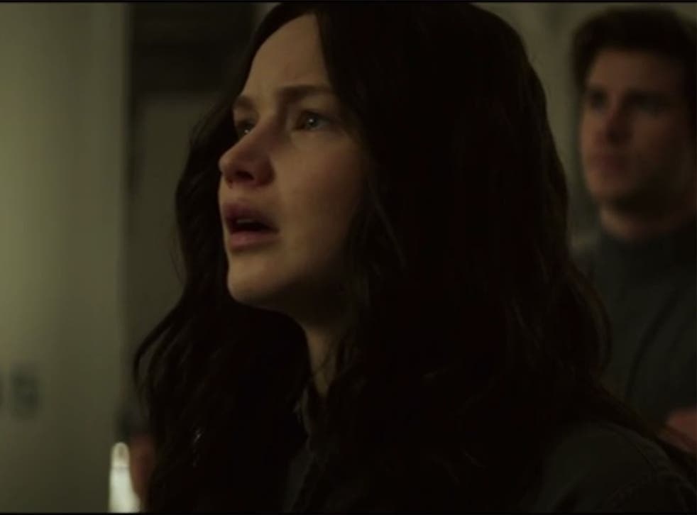 Jennifer Lawrence's Katniss Everdeen learns that Peeta is still alive in Mockingjay Part 1