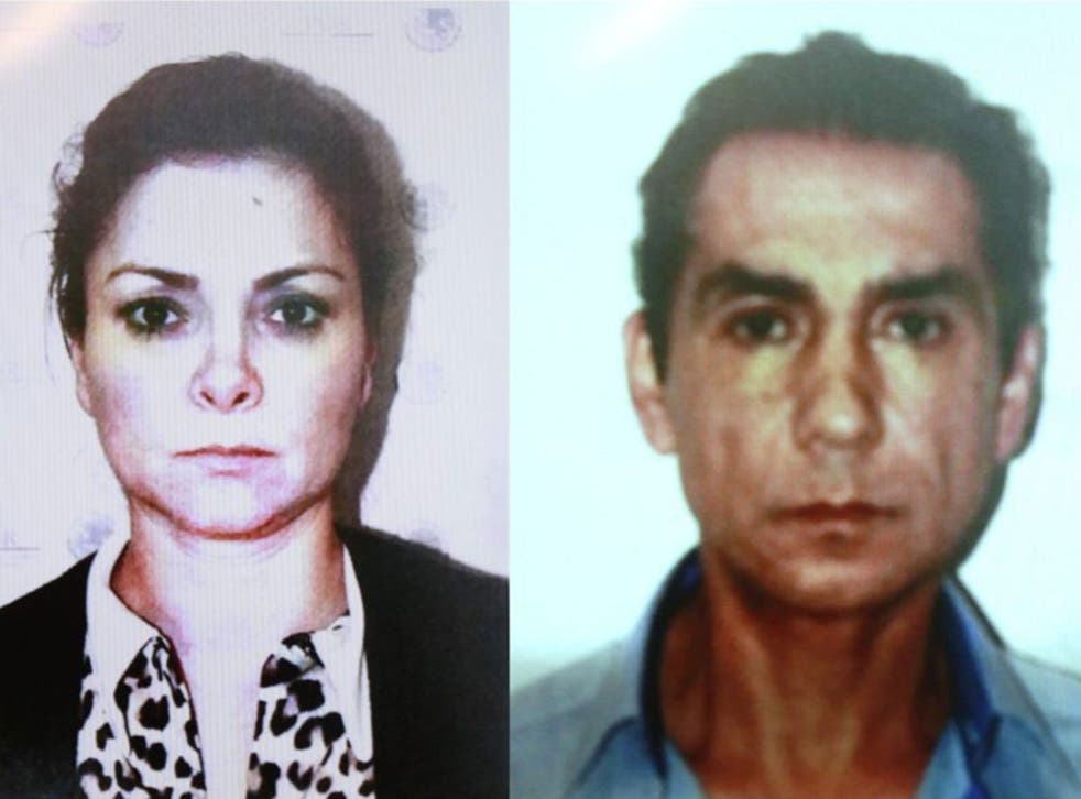A handout photograph made available by the Mexican Attorney General's Office shows Jose Luis Abarca (R), and his wife, Maria de los Angeles Pineda