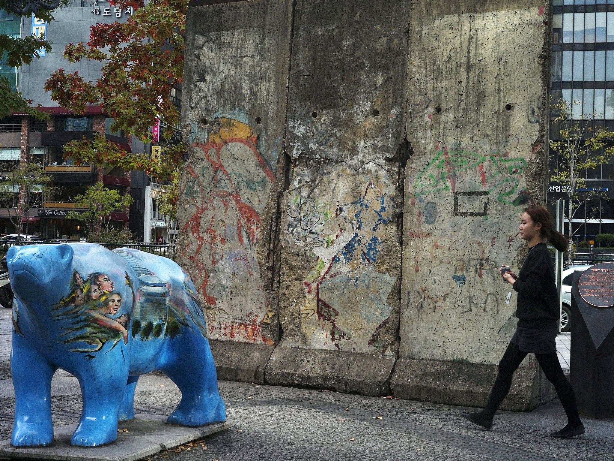Three segments of the Berlin Wall and a figure of a bear, symbolic of Berlin, in Seoul 