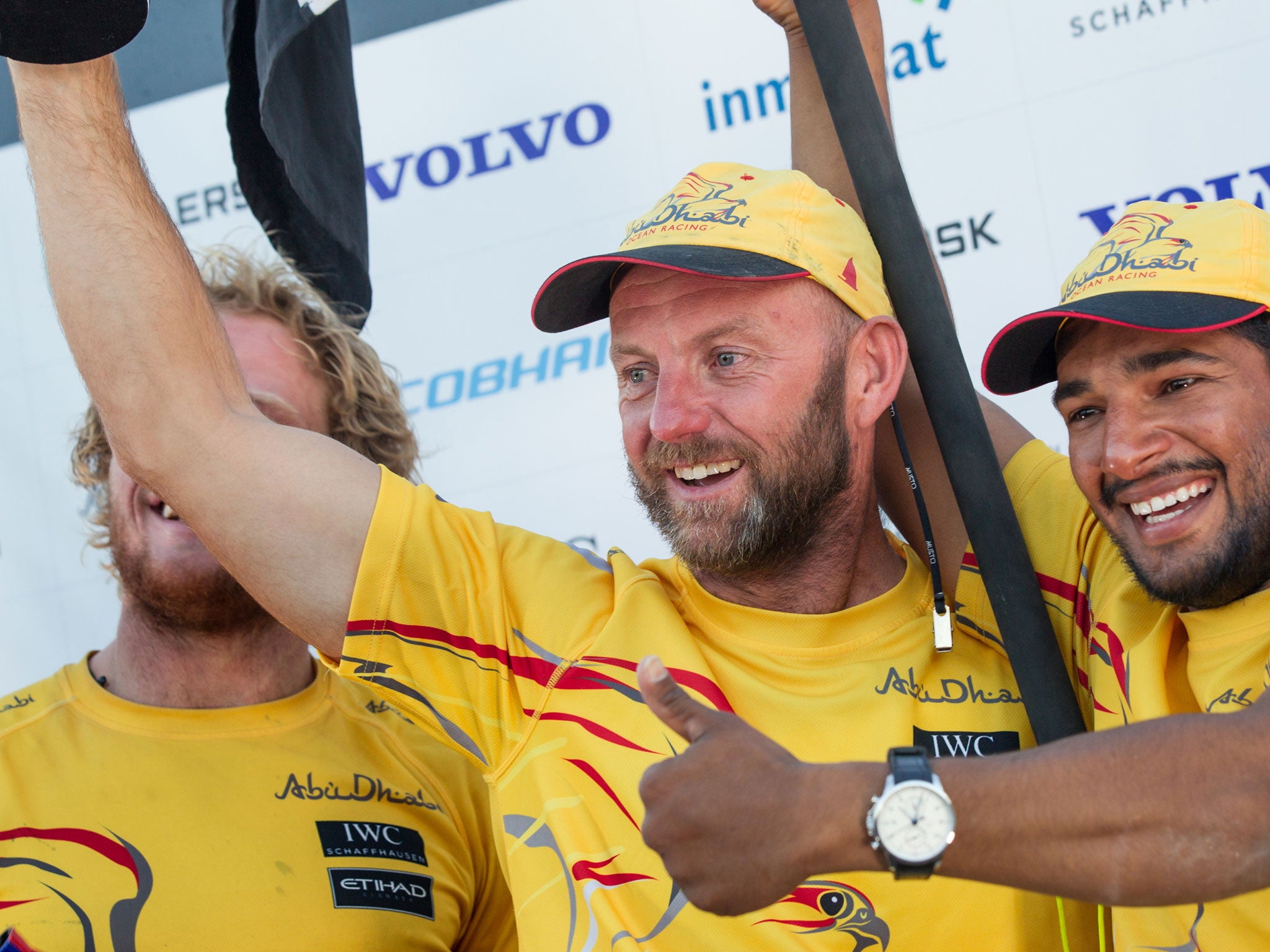 In this handout image provided by the Volvo Ocean Race, Skipper Ian Walker, Adil Khalid and Luke Parkinson on stage for the prize giving