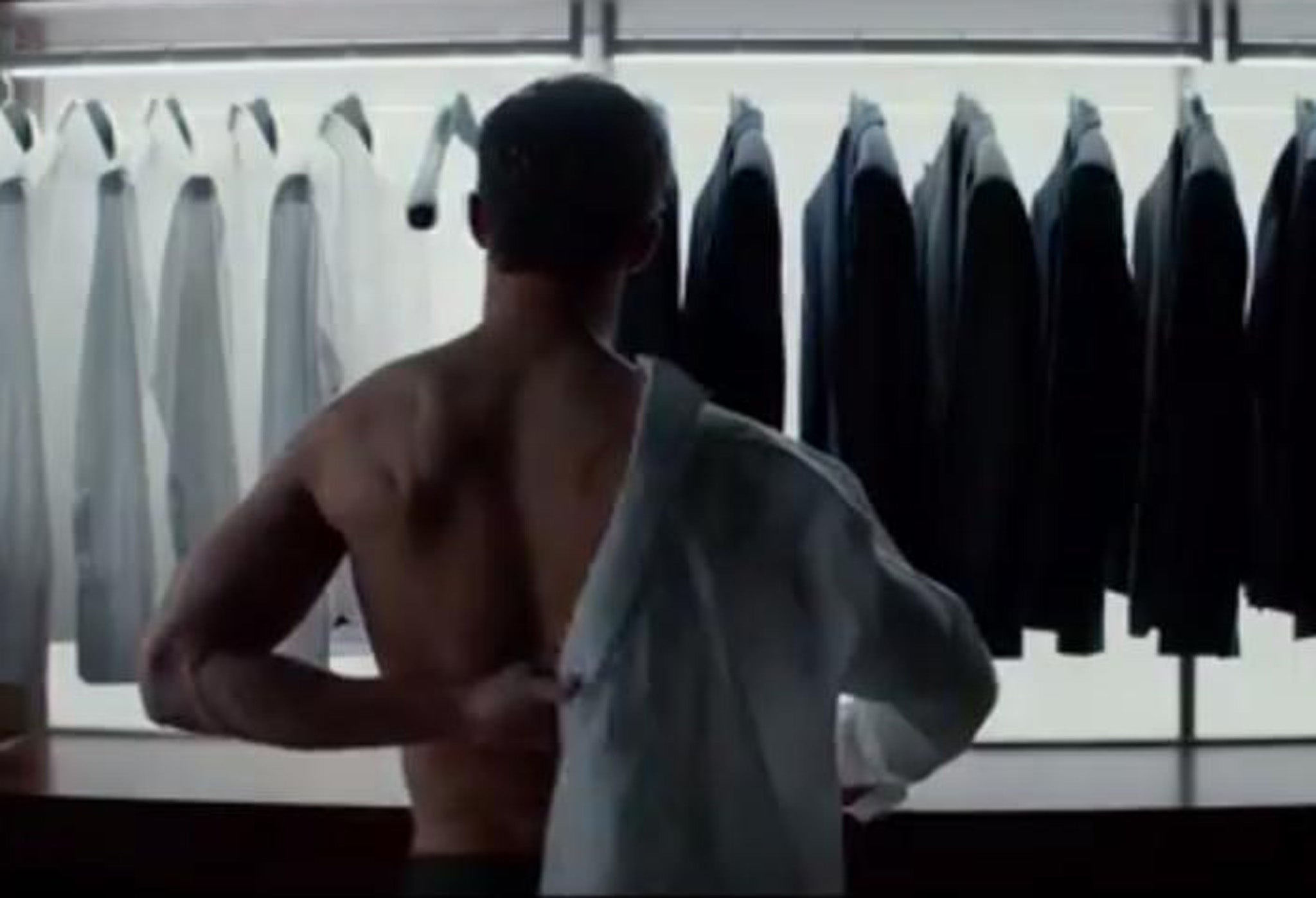 Jamie Dornan plays Christian Grey getting ready for work
