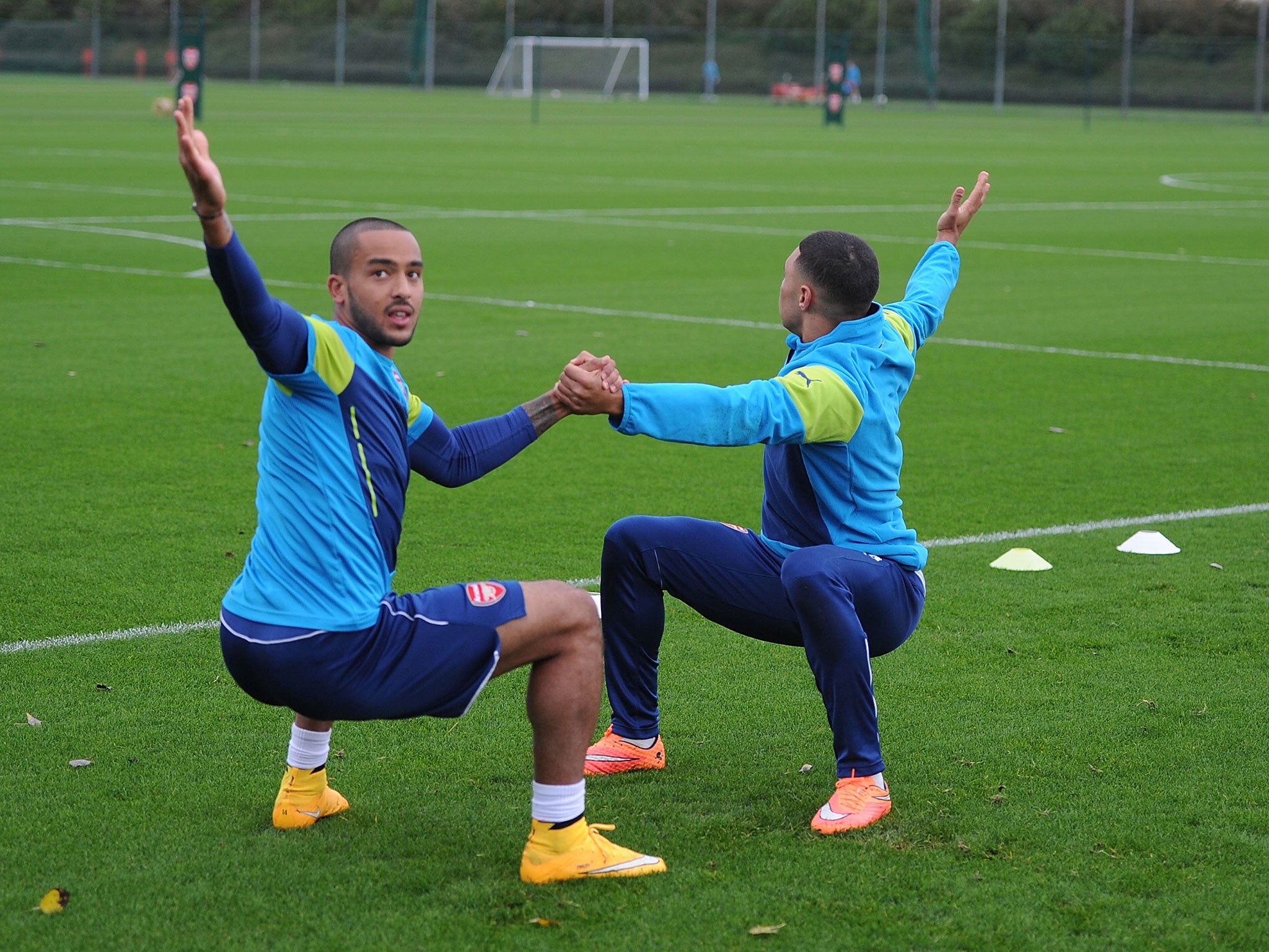 Walcott and Alex Oxlade-Chamberlain during an Arsenal training session