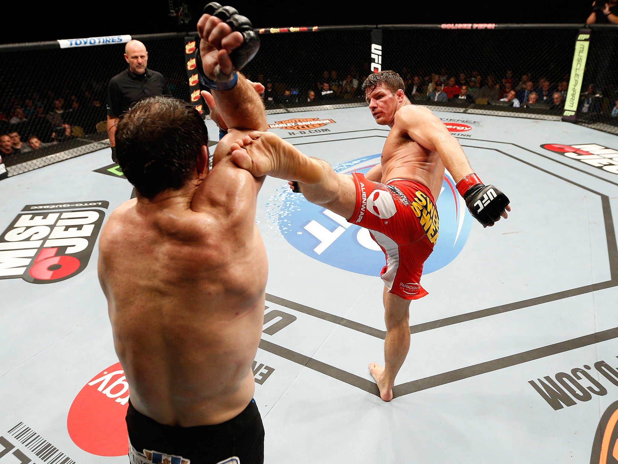 Michael Bisping kicks Tim Kennedy