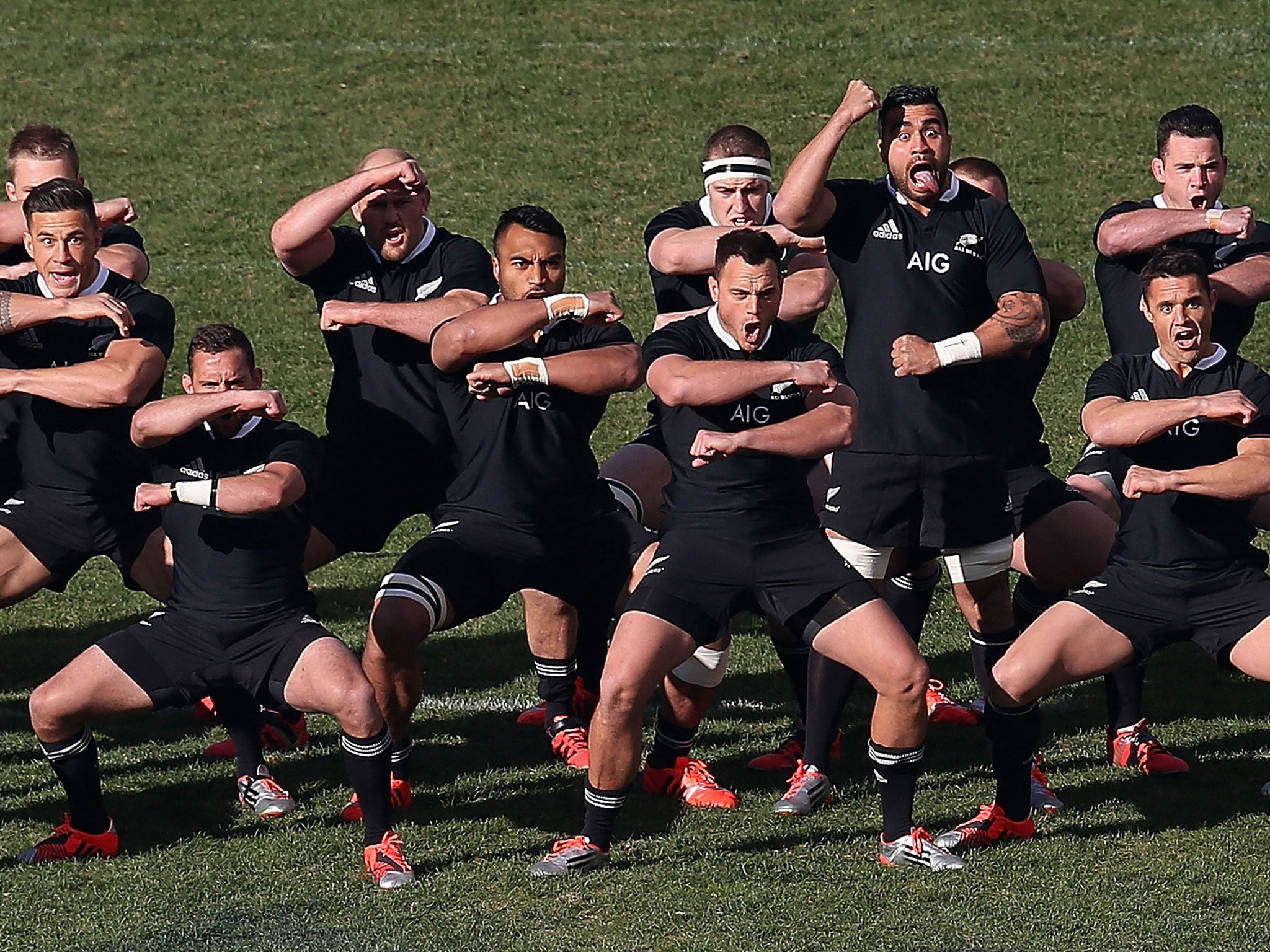 New Zealand players perform the Haka before taking on the United States