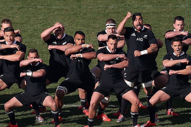 New Zealand players perform the Haka before taking on the United States