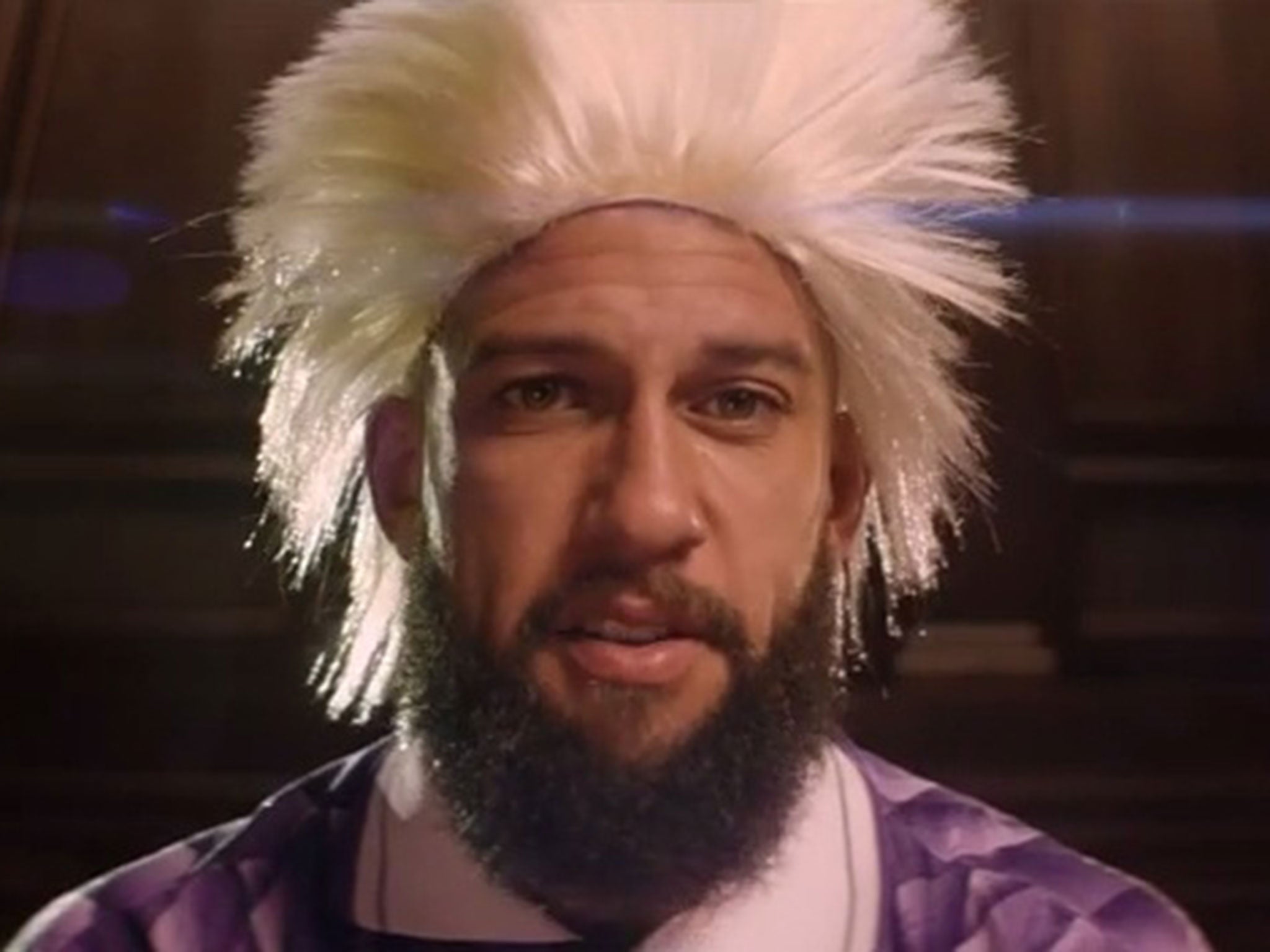 Tim Howard sports a wig in the Western Union advert