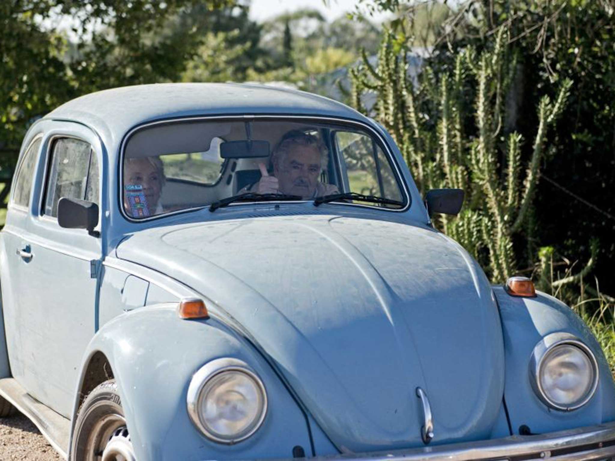 President Jose Mujica and his wife in the VW Beetle