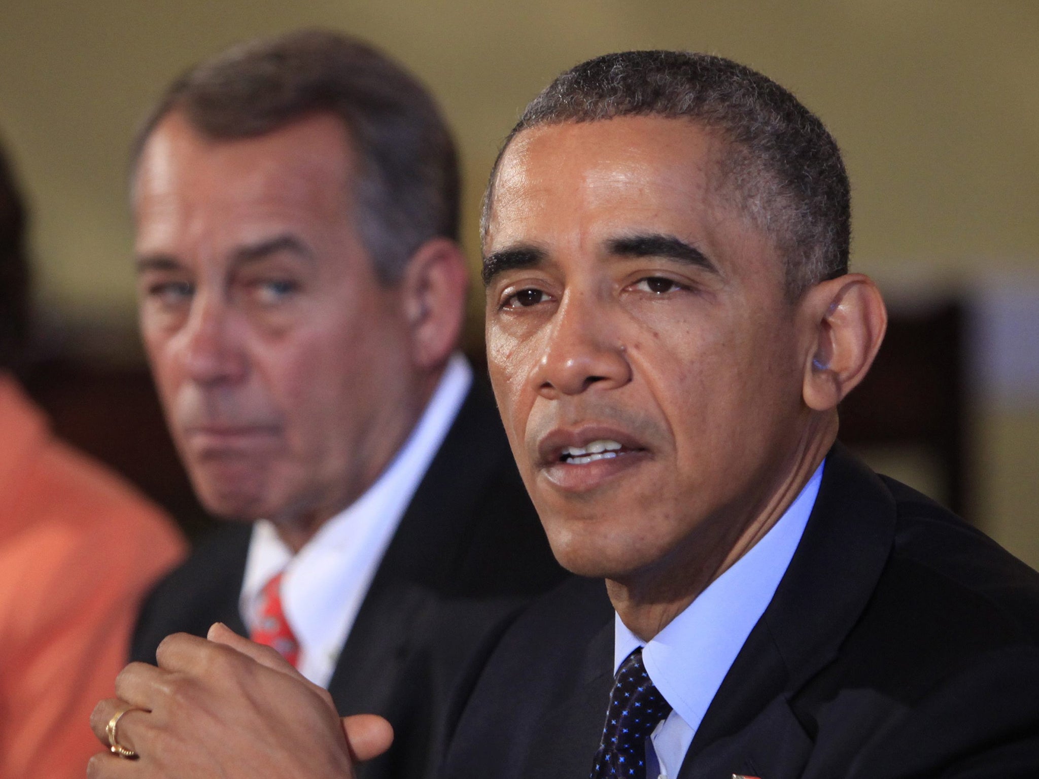 President Barack Obama meets with bipartisian congressional leadership, including Speaker of the House John Boehner (left)
