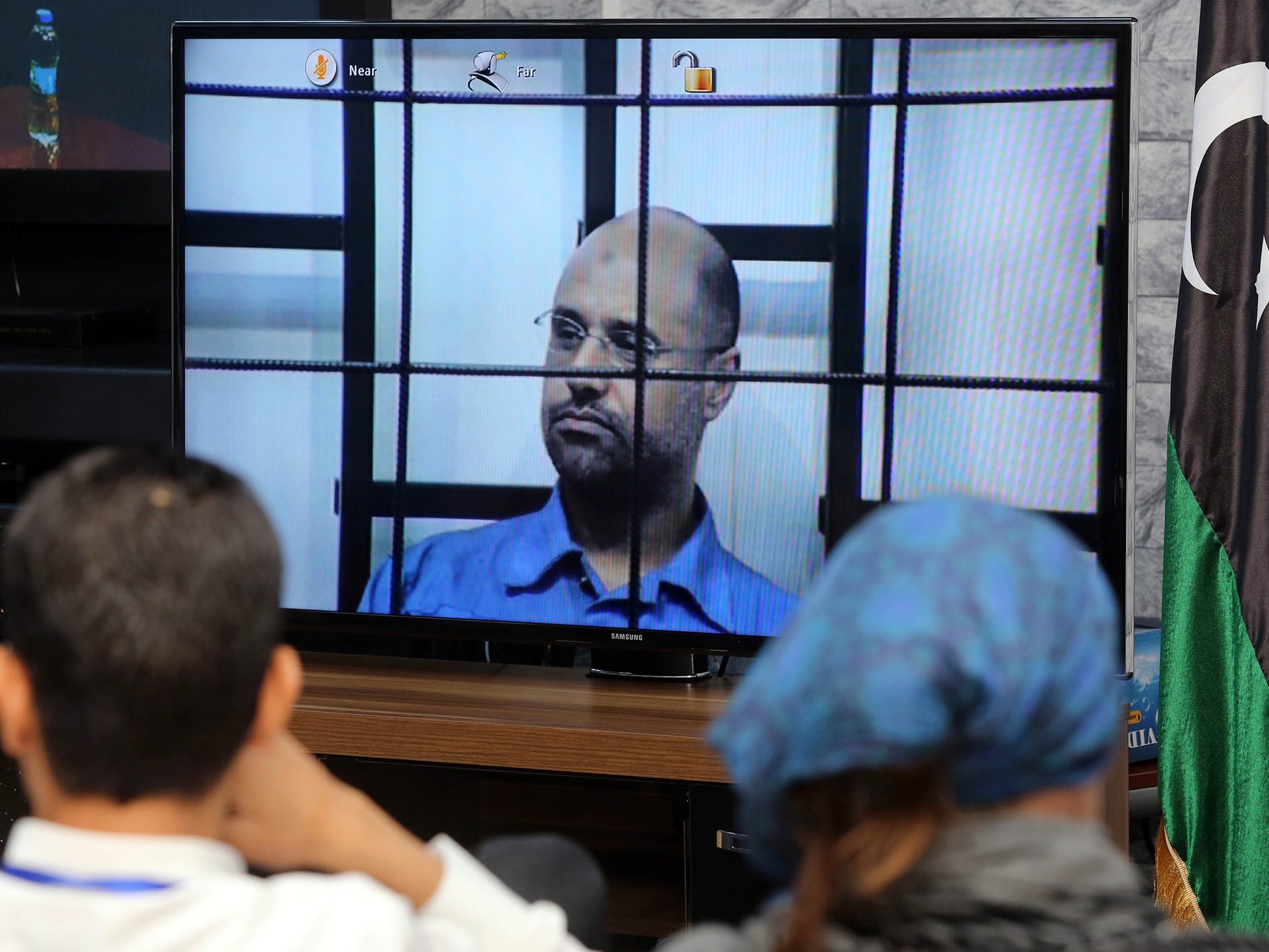 Gaddafi gave evidence to the Tripoli court via video link from the mountain town of Zintan (AFP/Getty)