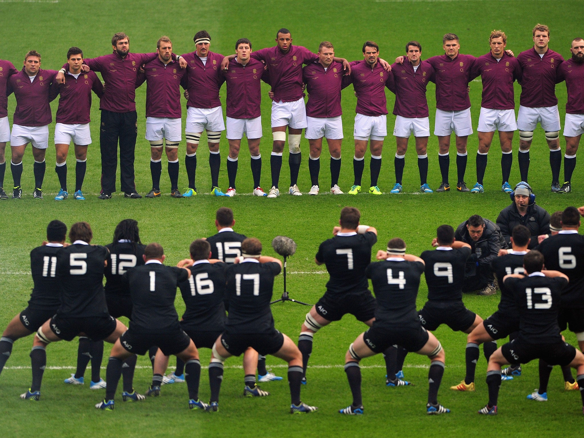 New Zealand perform the Haka in front of England's squad