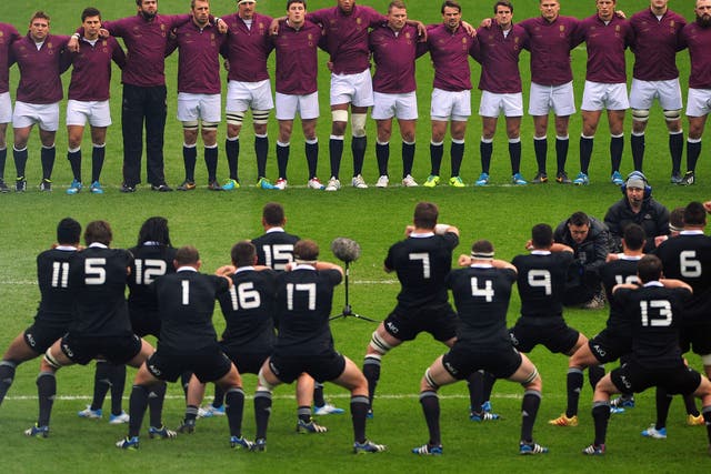 New Zealand perform the Haka in front of England's squad