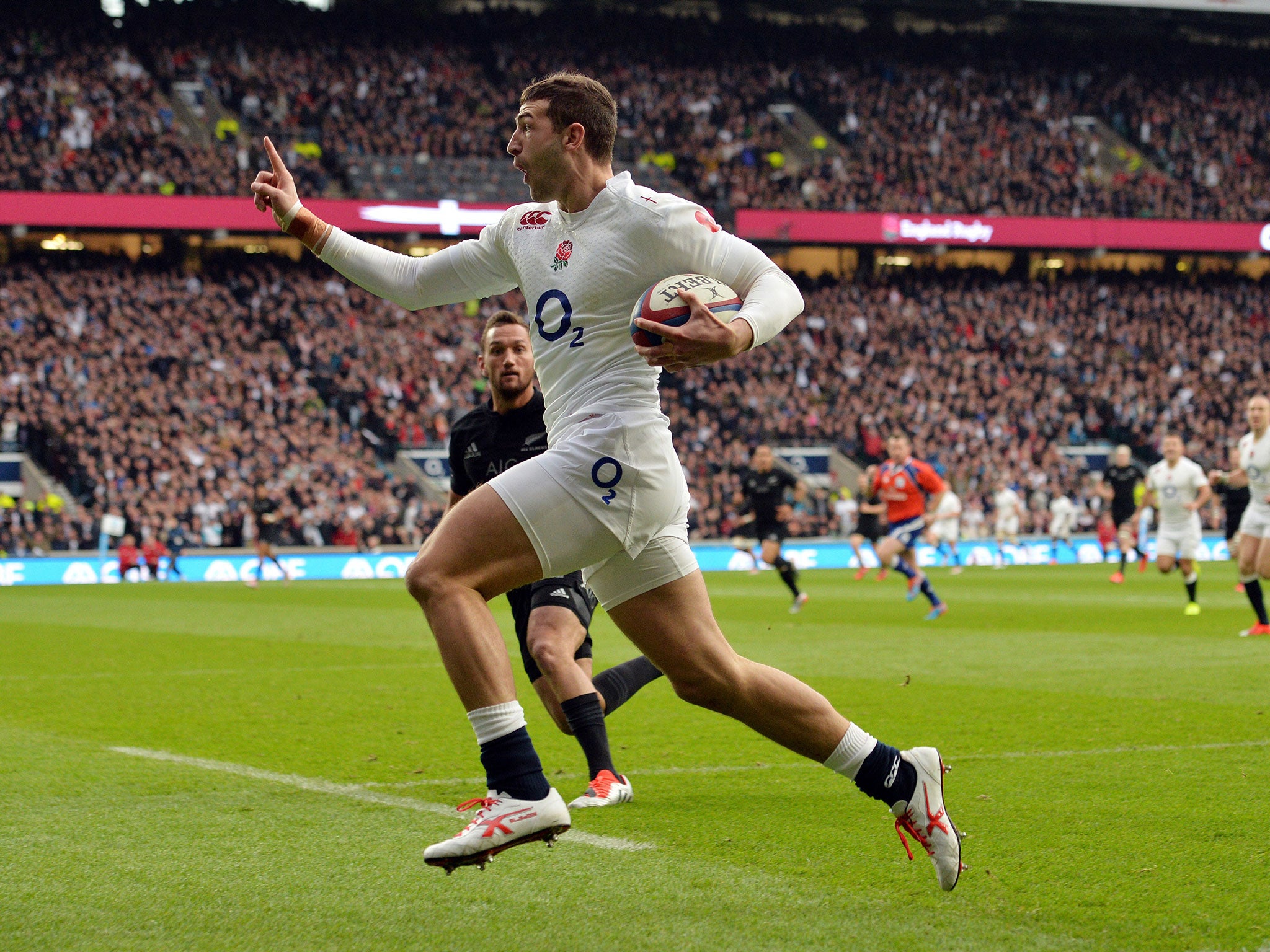 Jonny May races over for his first international try