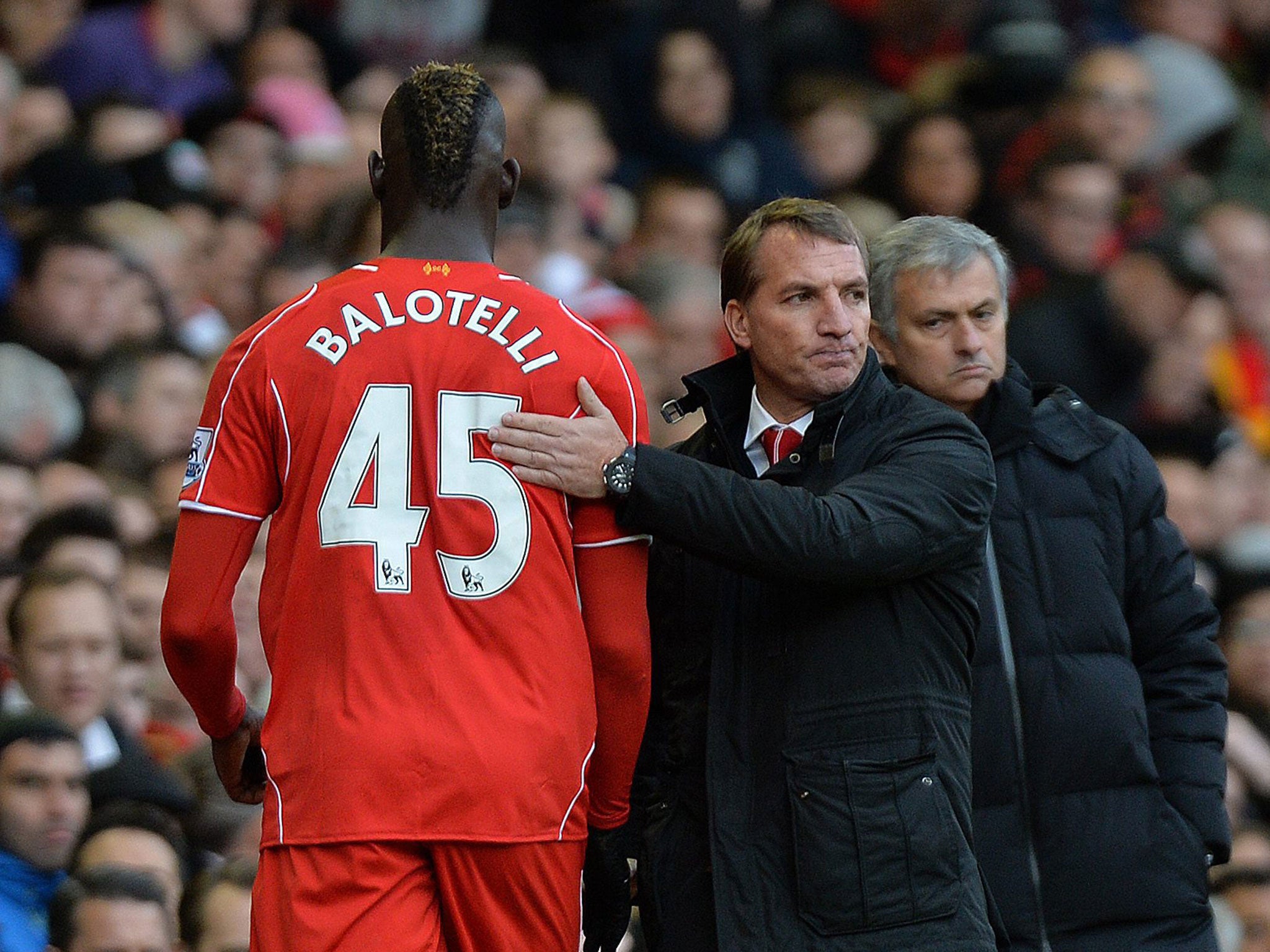 Mario Balotelli (left) is substituted by Brendan Rodgers (right)