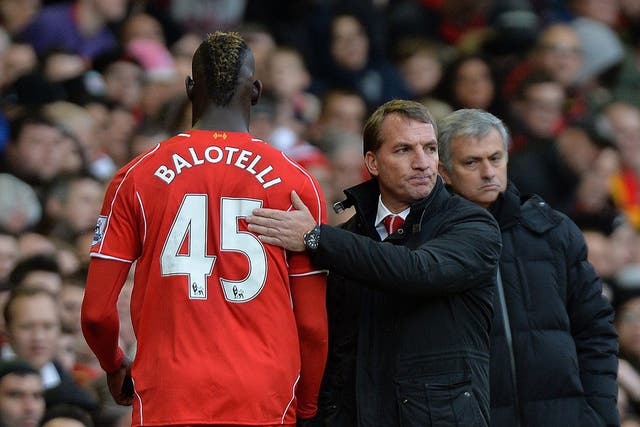 Mario Balotelli (left) is substituted by Brendan Rodgers (right)