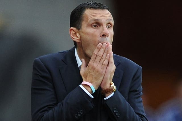 Gus Poyet reacts on the touchline