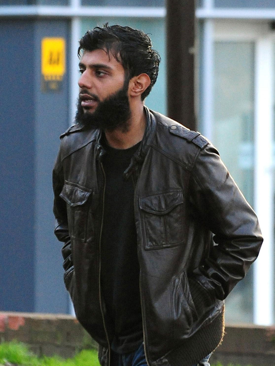Kabir Ahmed, 28, arrives at Derby Crown Court where, along with 4 others, he is to go on trial accused of stirring up hatred on the grounds of sexual orientation in the first prosecution of its kind