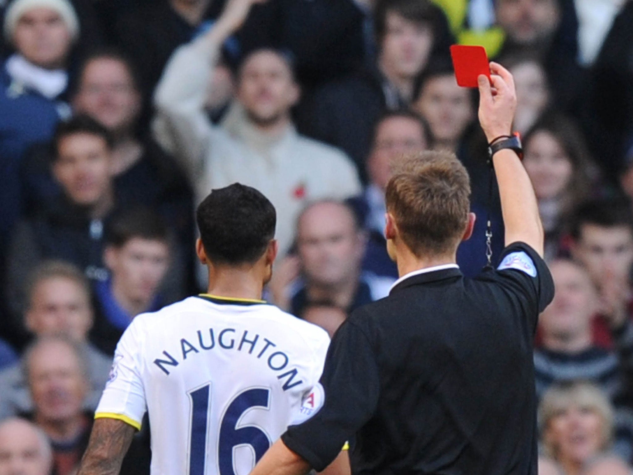 Kyle Naughton receives his red card