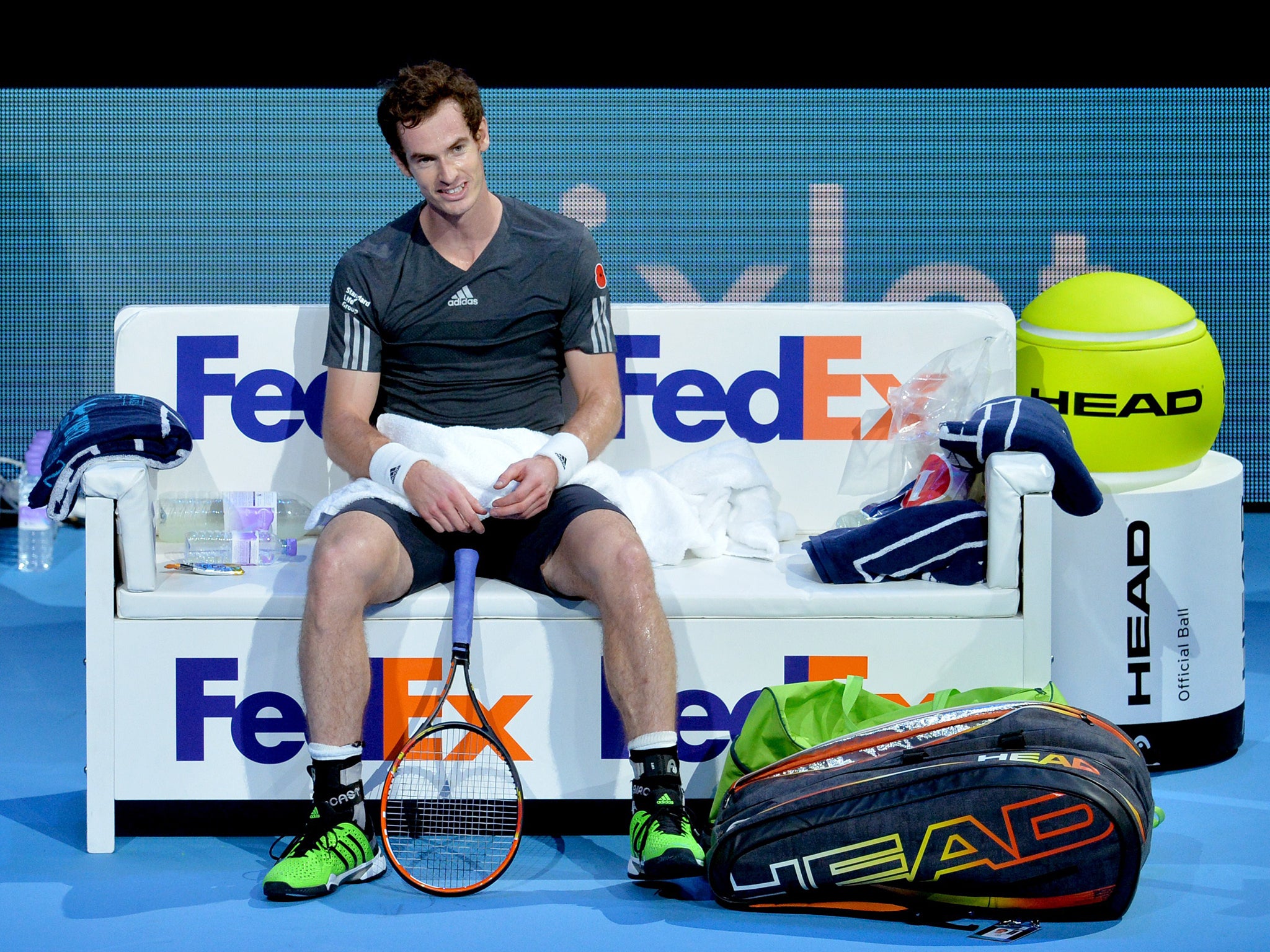 Britain's Andy Murray rests between sets during his singles group B match against Japan's Kei Nishikori