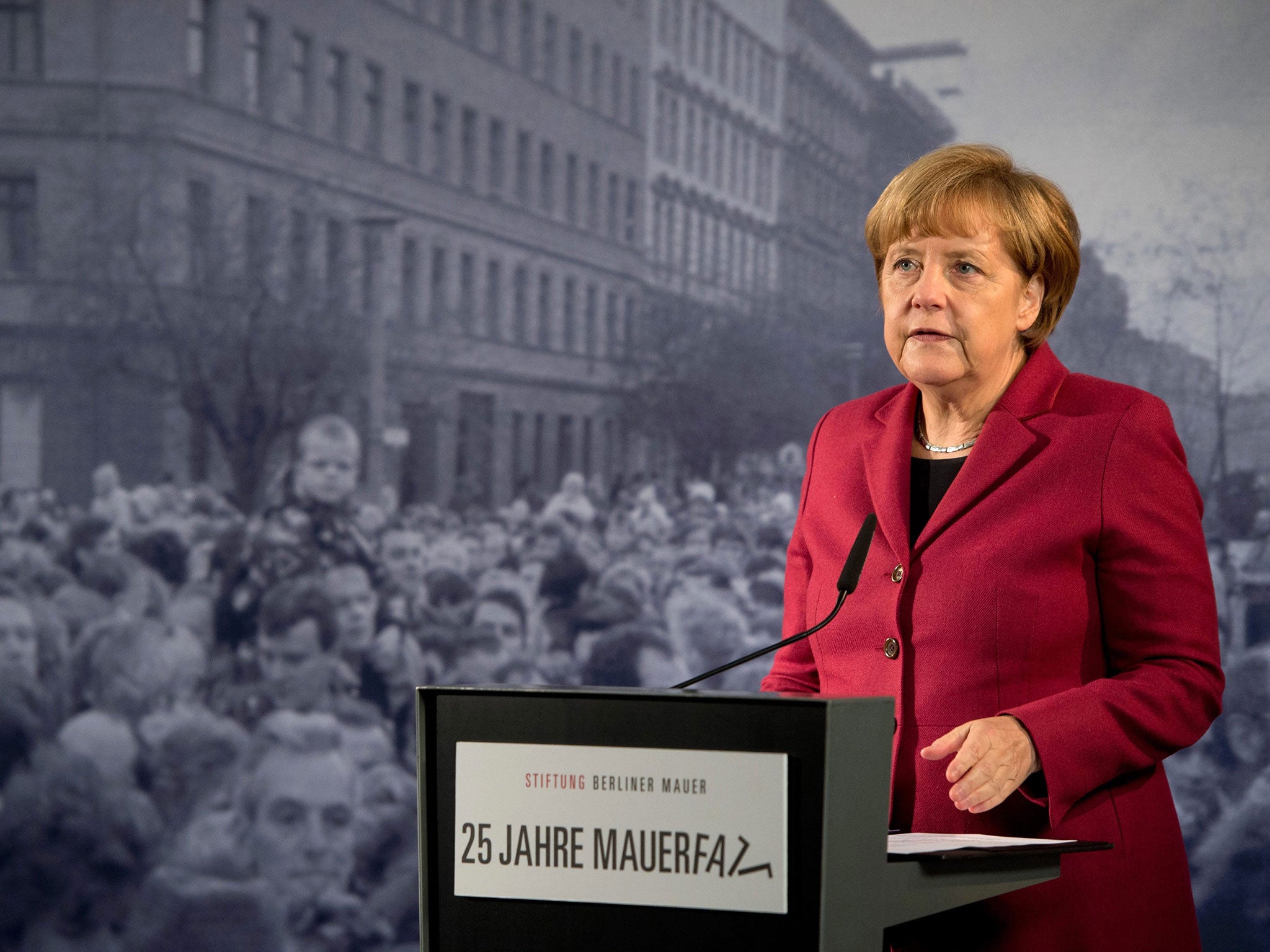 German Chancellor Angela Merkel speaks during the central commemorative event at the Berlin Wall Memorial Bernauer Strasse on 9 November 2014