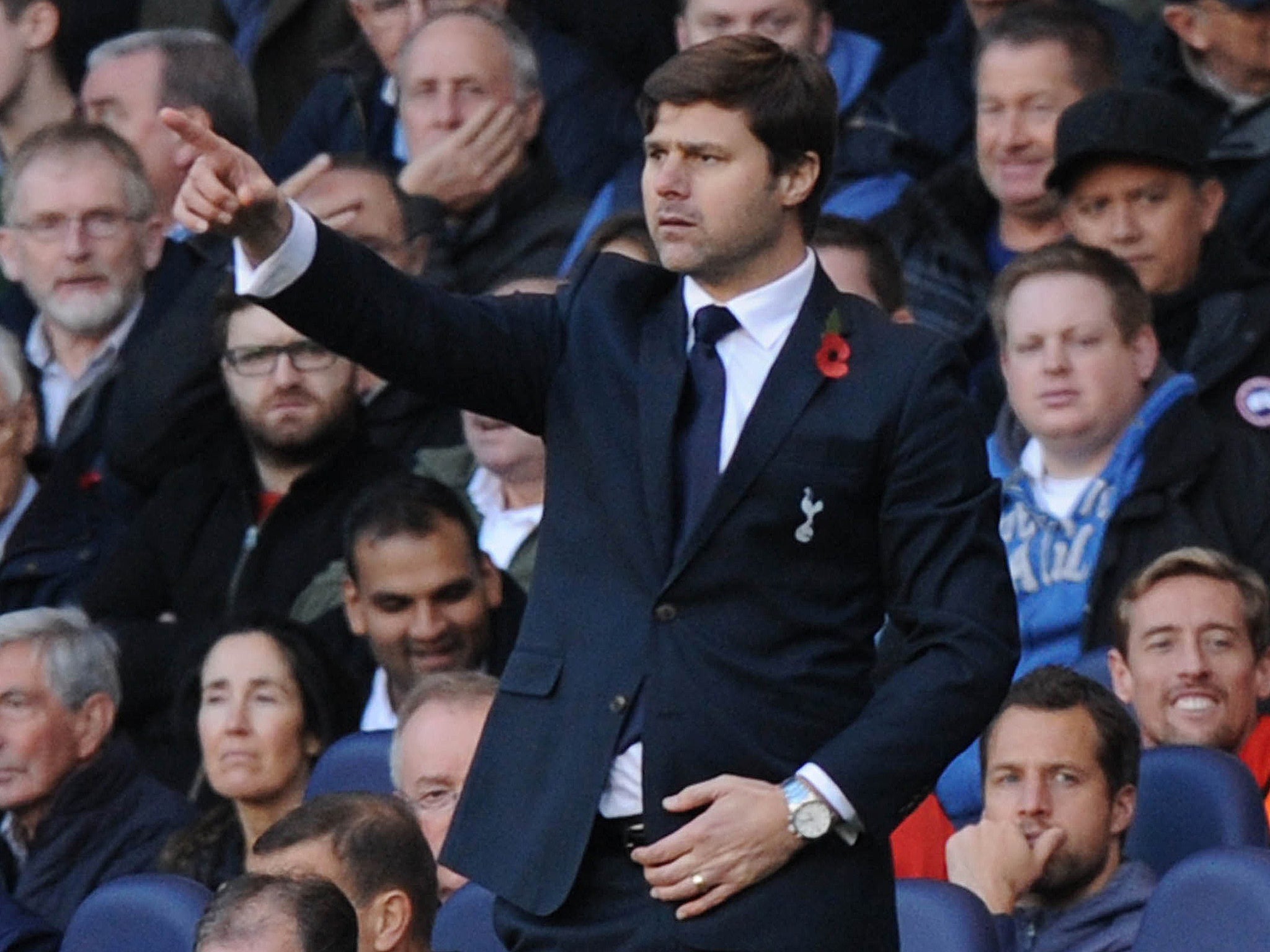 Tottenham Hotspurs manager Mauricio Pochettino gestures from his technical area during the Premier League football match against Stoke