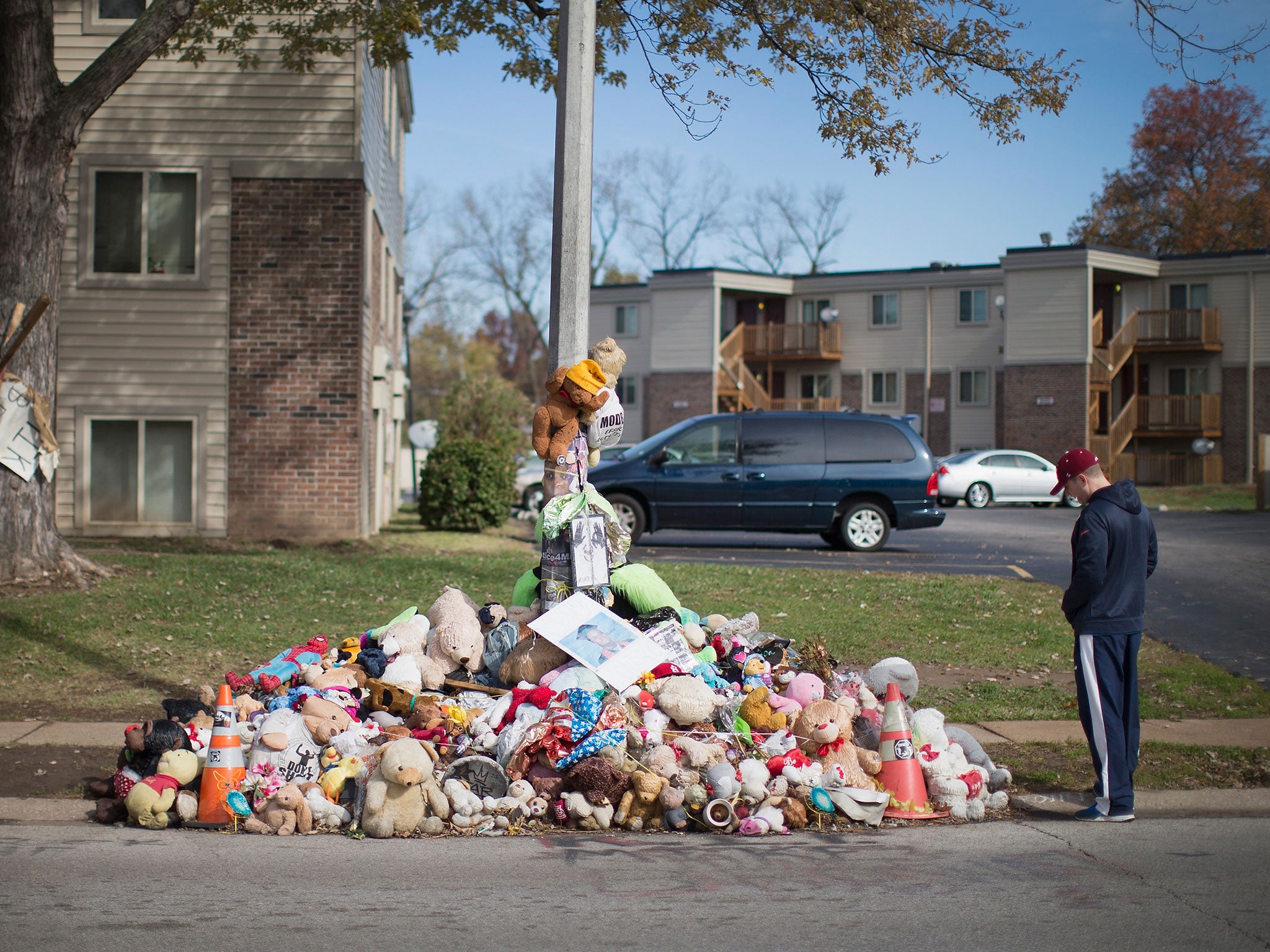 A makeshift memorial on the street in Ferguson where Michael Brown died