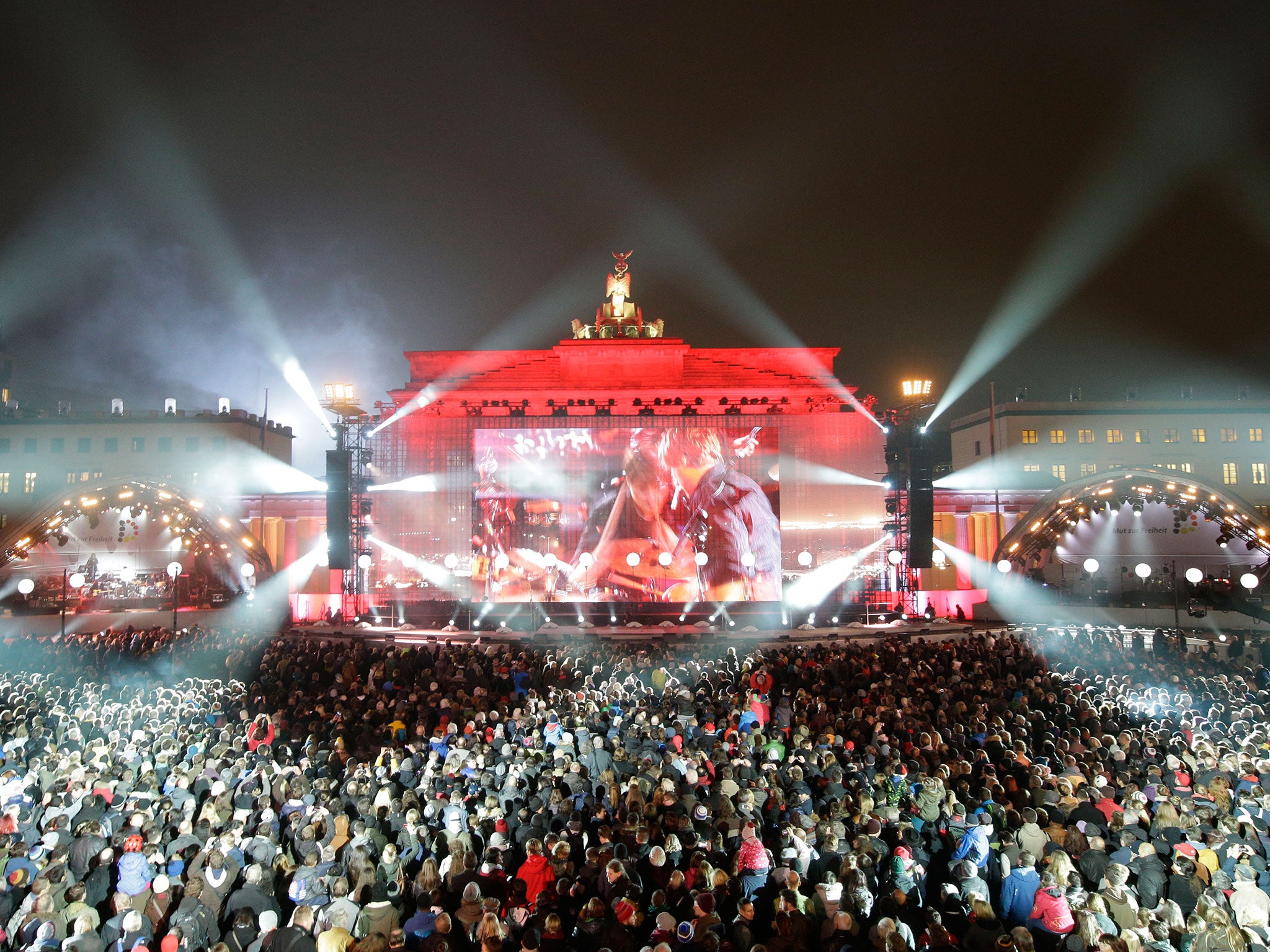 Huge crowds gather for an open-air party at Brandenburg Gate