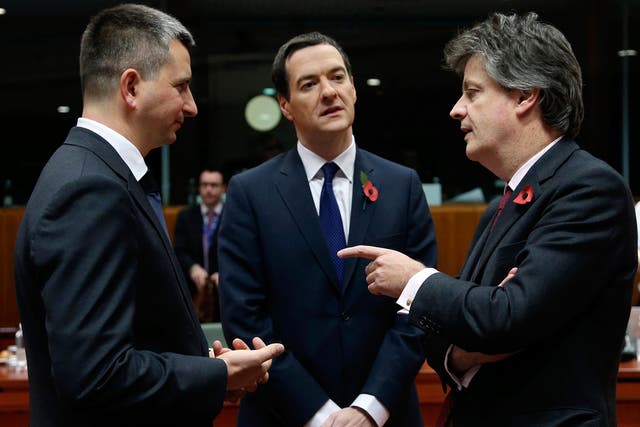 George Osborne with Mateusz Szczurek, Polish finance minister, and Lord Hill, European Financial Commissioner, in Brussels