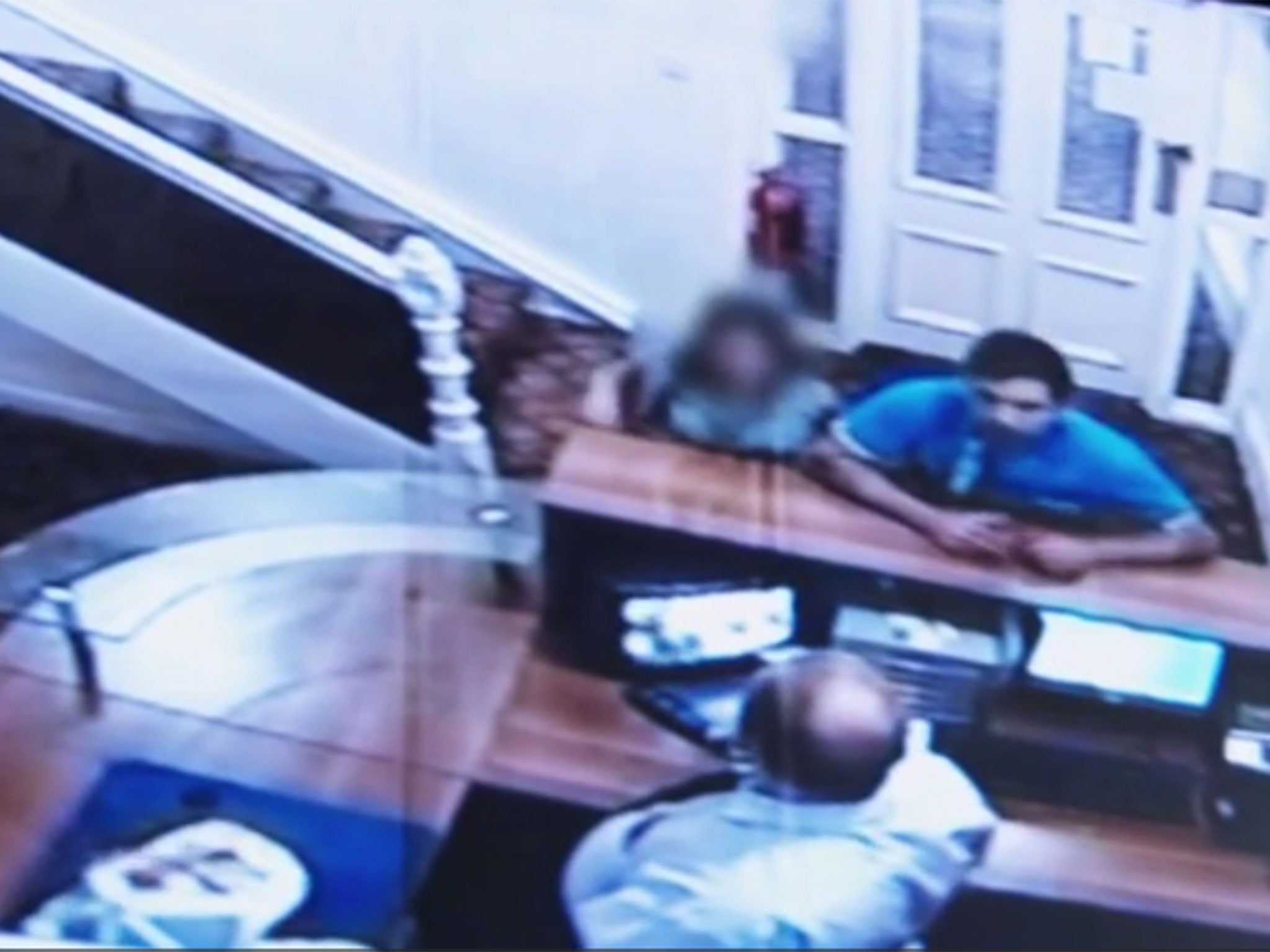CCTV footage shows the 13-year-old in a hotel lobby with an Asian man