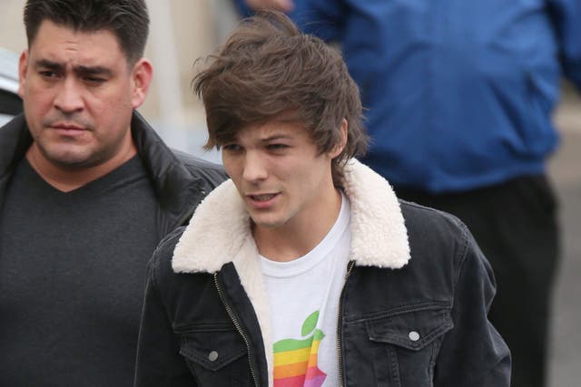 Louis Tomlinson showed his support for gay Apple CEO Tim Cook on a trip to The X Factor studio in November 2014