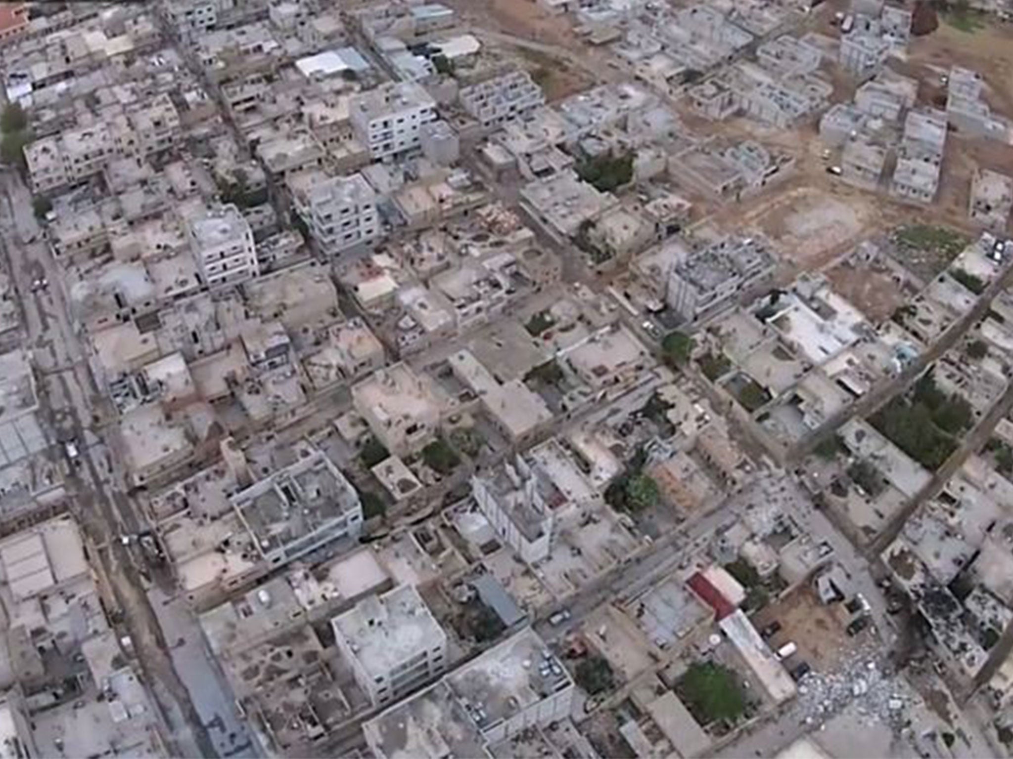 An image grab taken from a video released by Isis purportedly showing aerial footage of the town of Kobani